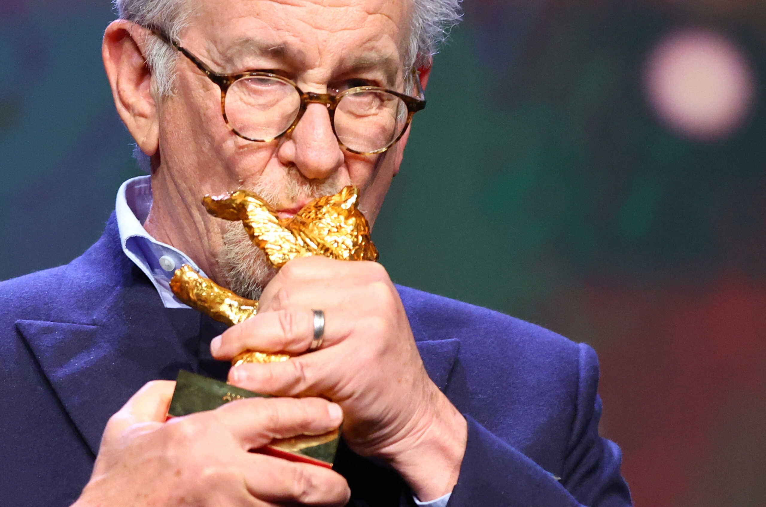 Director Steven Spielberg kisses the Honorary Golden Bear Award for Lifetime Achievement which he received at the 73rd Berlinale International Film Festival in Berlin, Germany, February 21, 2023. REUTERS