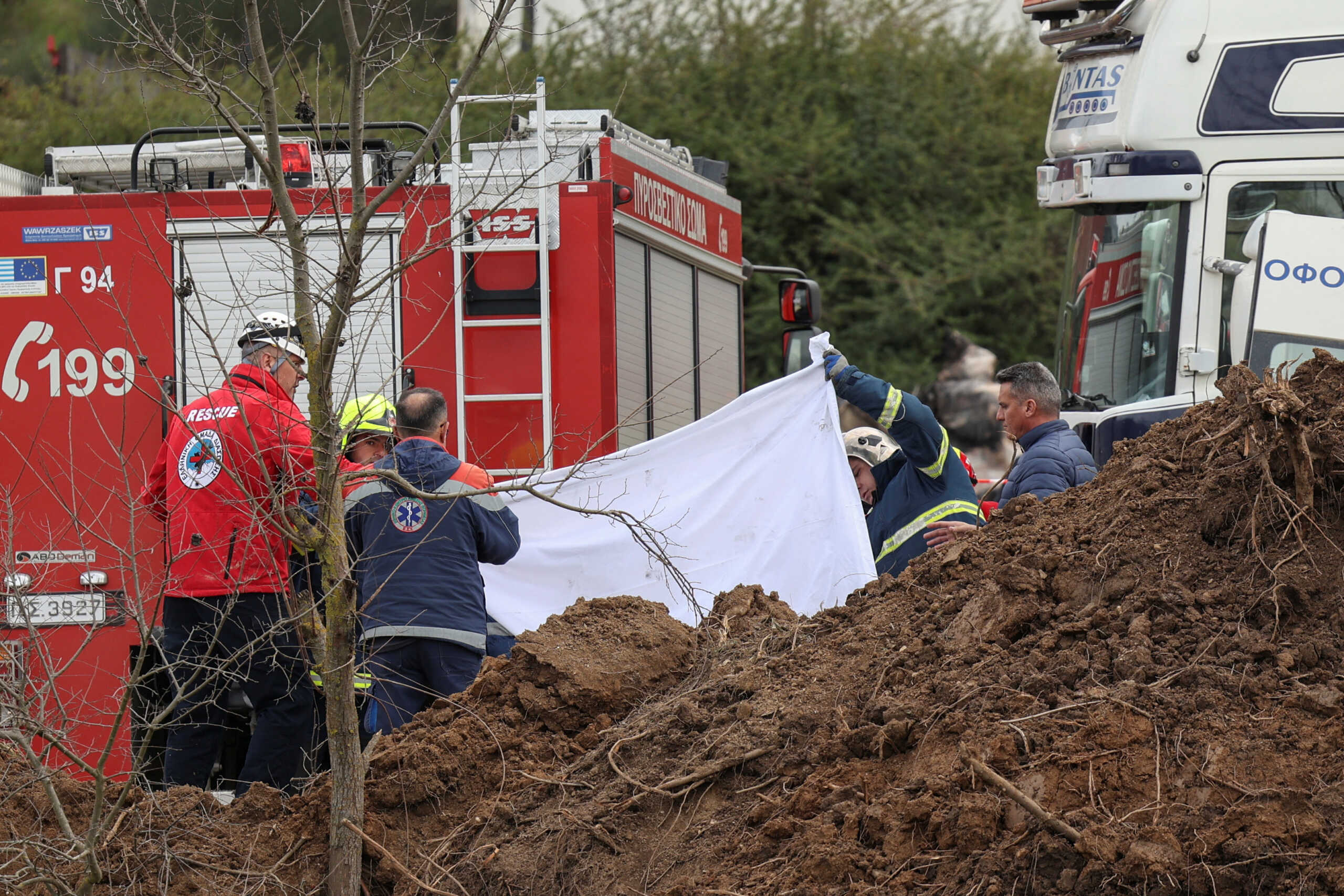 Rescuers operate at the site of a crash, where two trains collided, near the city of Larissa, Greece, March 1, 2023. REUTERS