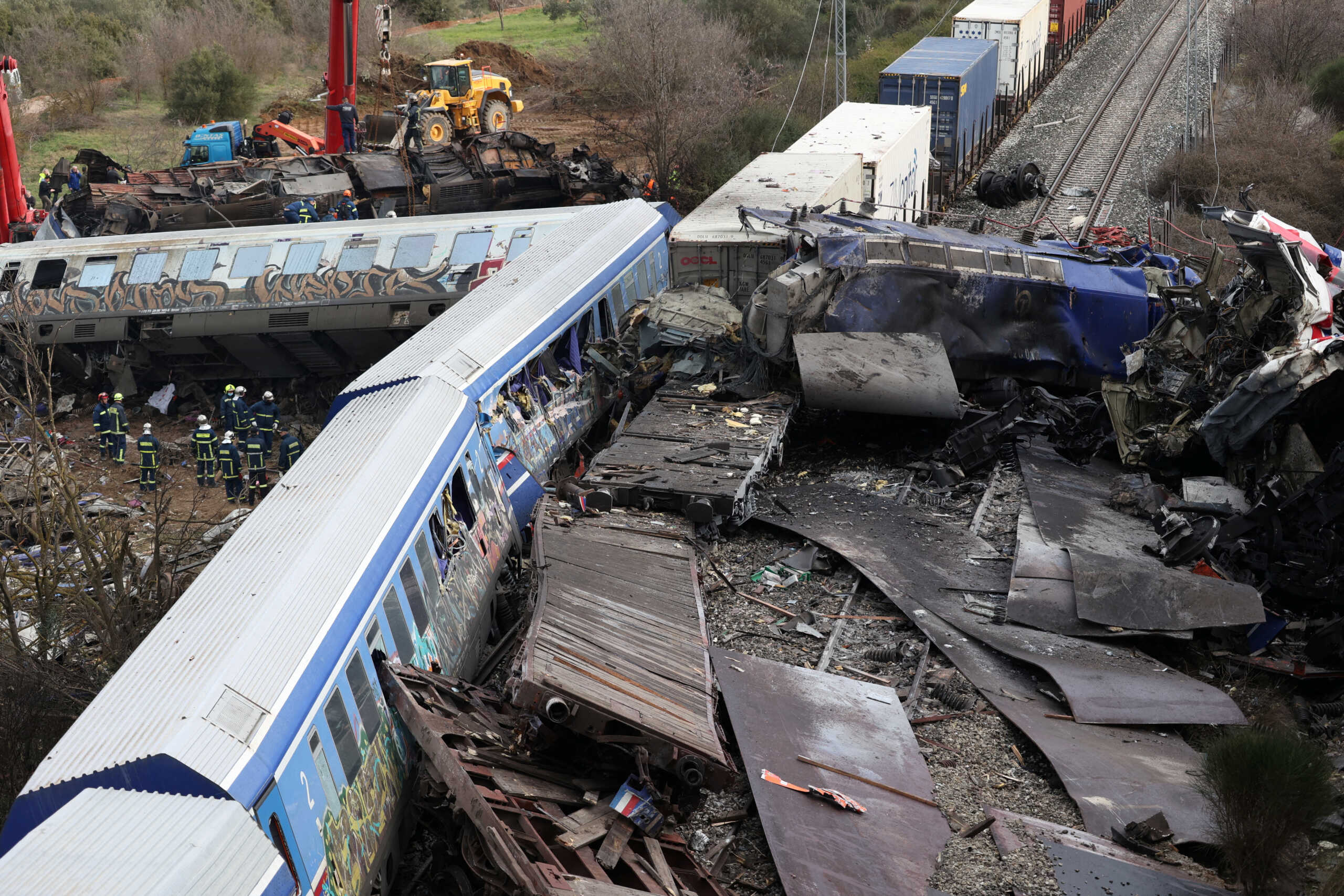 Destroyed train carriages are seen at the site of a crash, where two trains collided, near the city of Larissa, Greece, March 1, 2023. REUTERS