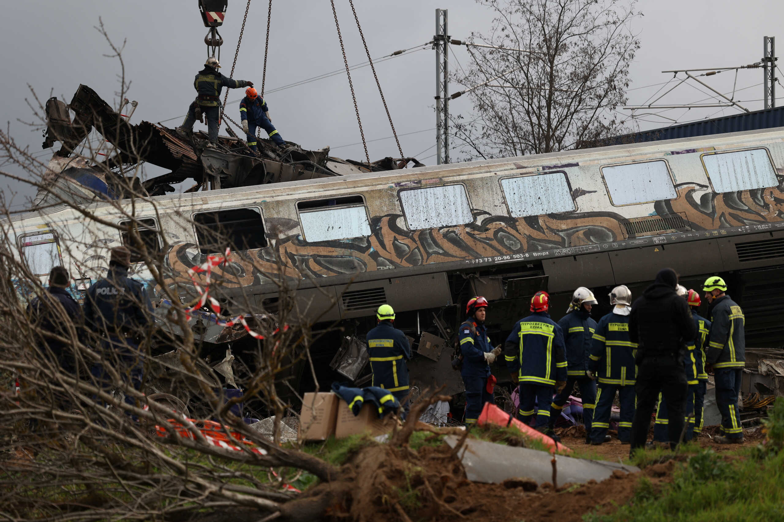 Rescuers operate at the site of a crash, where two trains collided, near the city of Larissa, Greece, March 1, 2023. REUTERS
