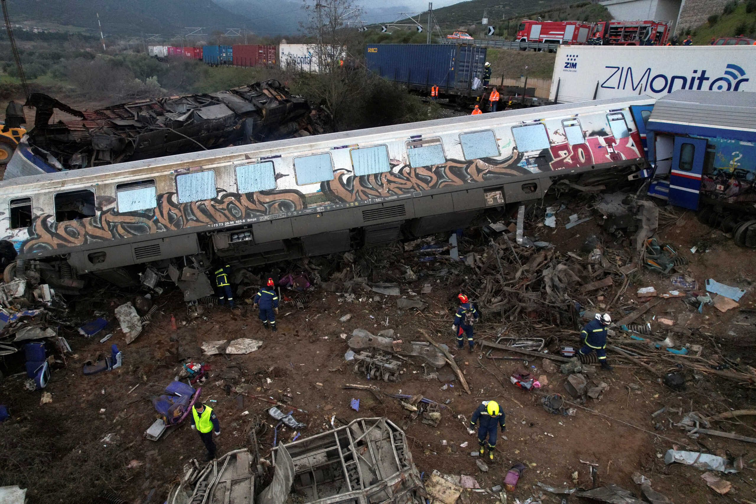 Rescue crews operate at the site of a crash, where two trains collided, near the city of Larissa, Greece, March 1, 2023. REUTERS