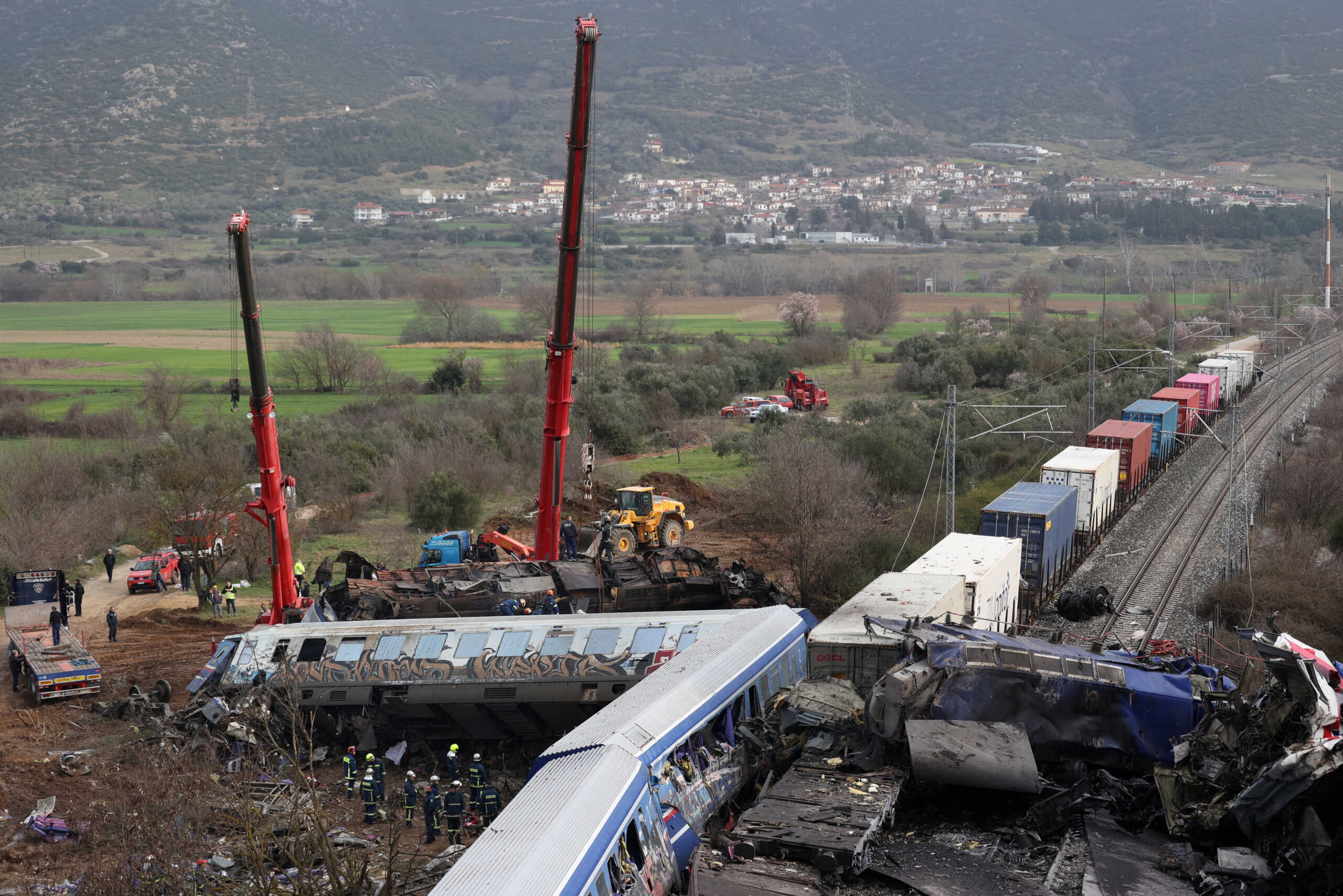 Rescuers operate at the site of a crash, where two trains collided, near the city of Larissa, Greece, March 1, 2023. REUTERS