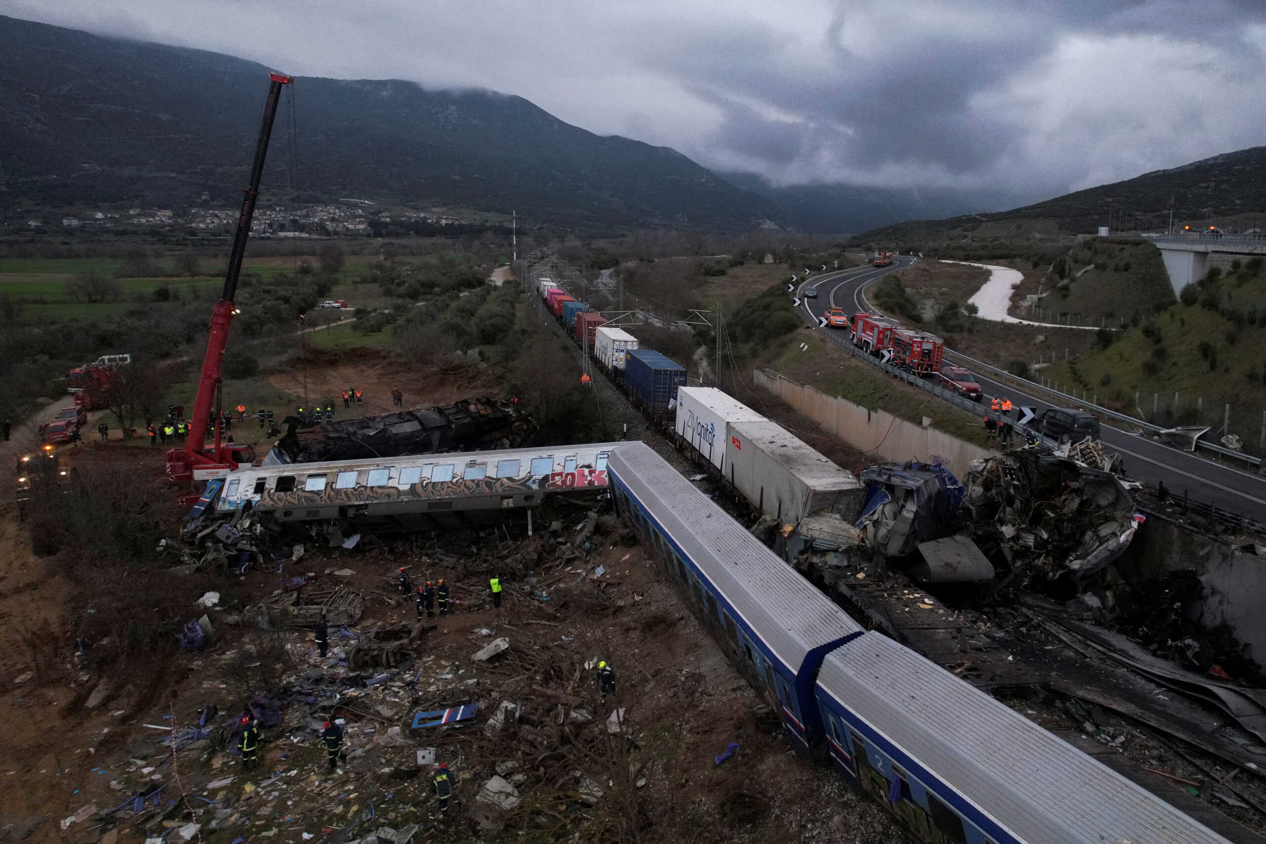 Rescue crews operate at the site of a crash, where two trains collided, near the city of Larissa, Greece, March 1, 2023. REUTERS