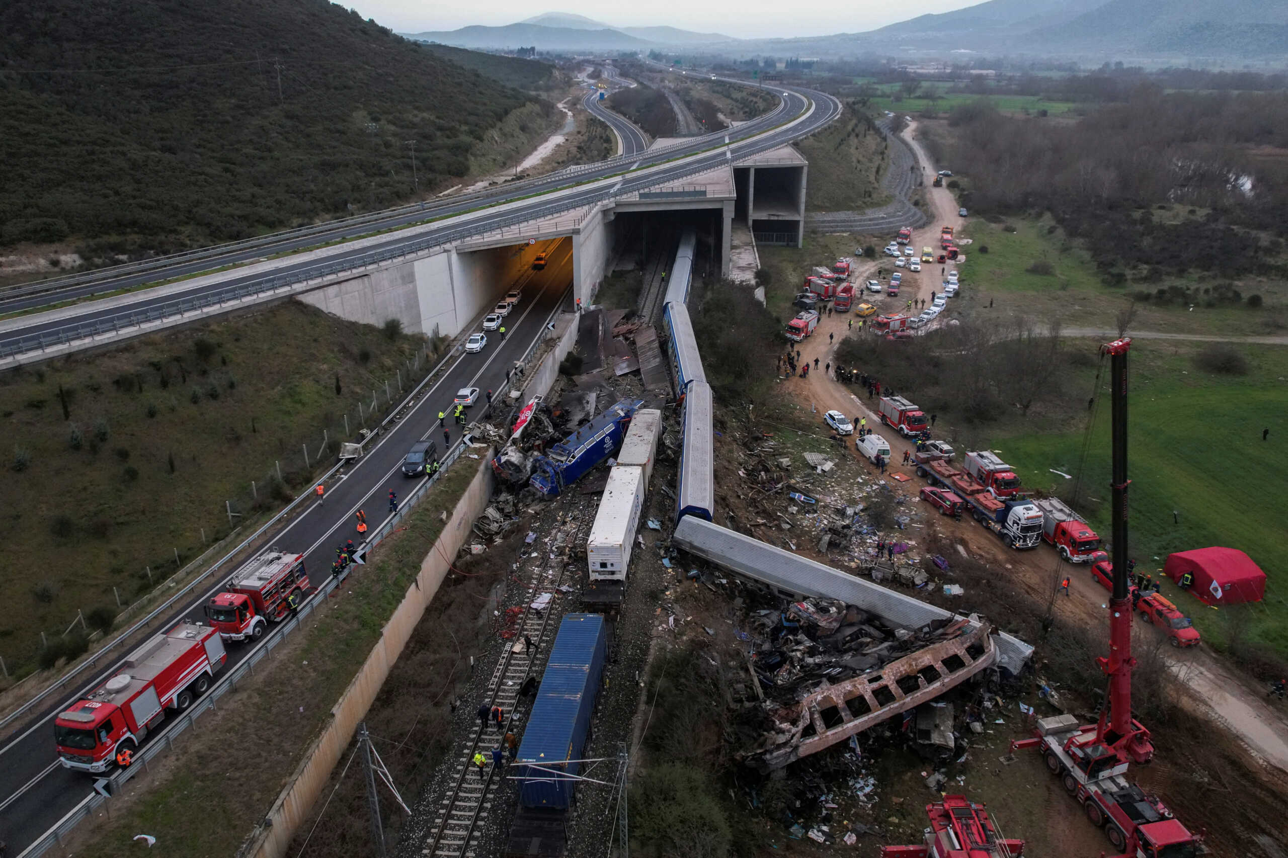 Rescue crews operate at the site of a crash, where two trains collided, near the city of Larissa, Greece, March 1, 2023. REUTERS
