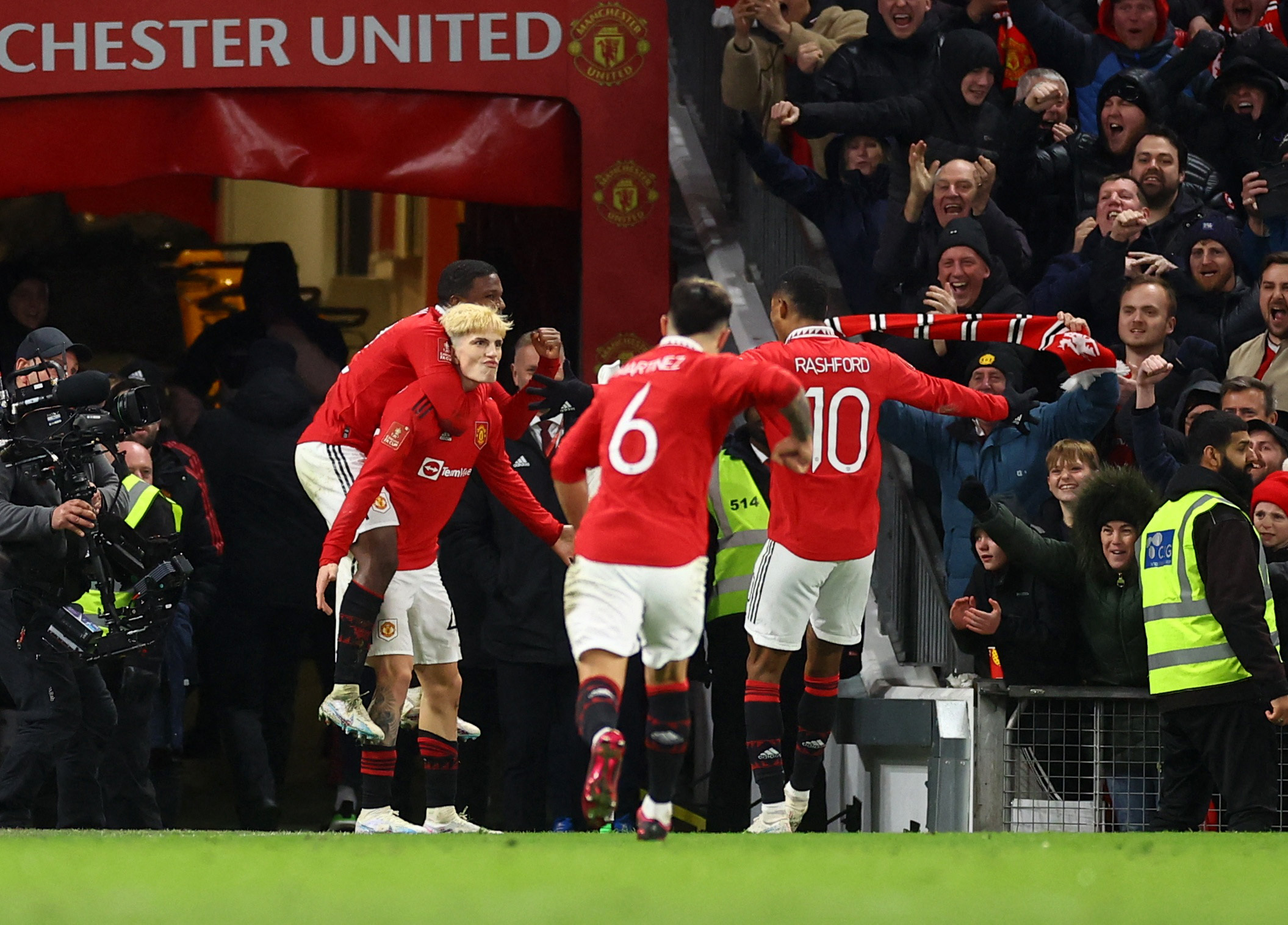 Soccer Football - FA Cup - Fifth Round - Manchester United v West Ham United - Old Trafford, Manchester, Britain - March 1, 2023 Manchester United's Alejandro Garnacho celebrates scoring their second goal with Tyrell Malacia, Lisandro Martinez and Marcus Rashford REUTERS