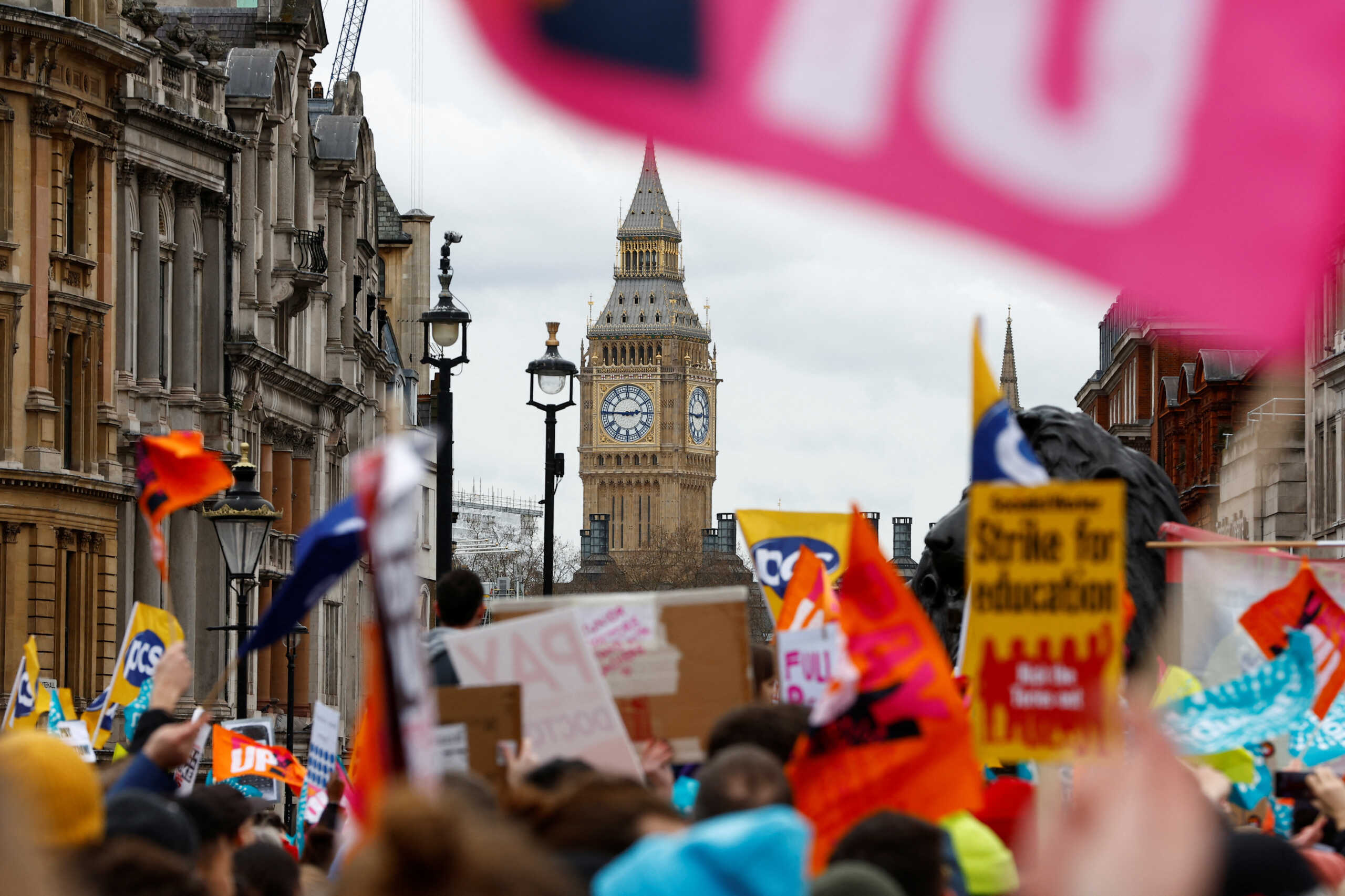 The Elizabeth Tower, more commonly known as Big Ben, is seen as teachers attend a march during strike action in a dispute over pay, in London, Britain March 15, 2023. REUTERS