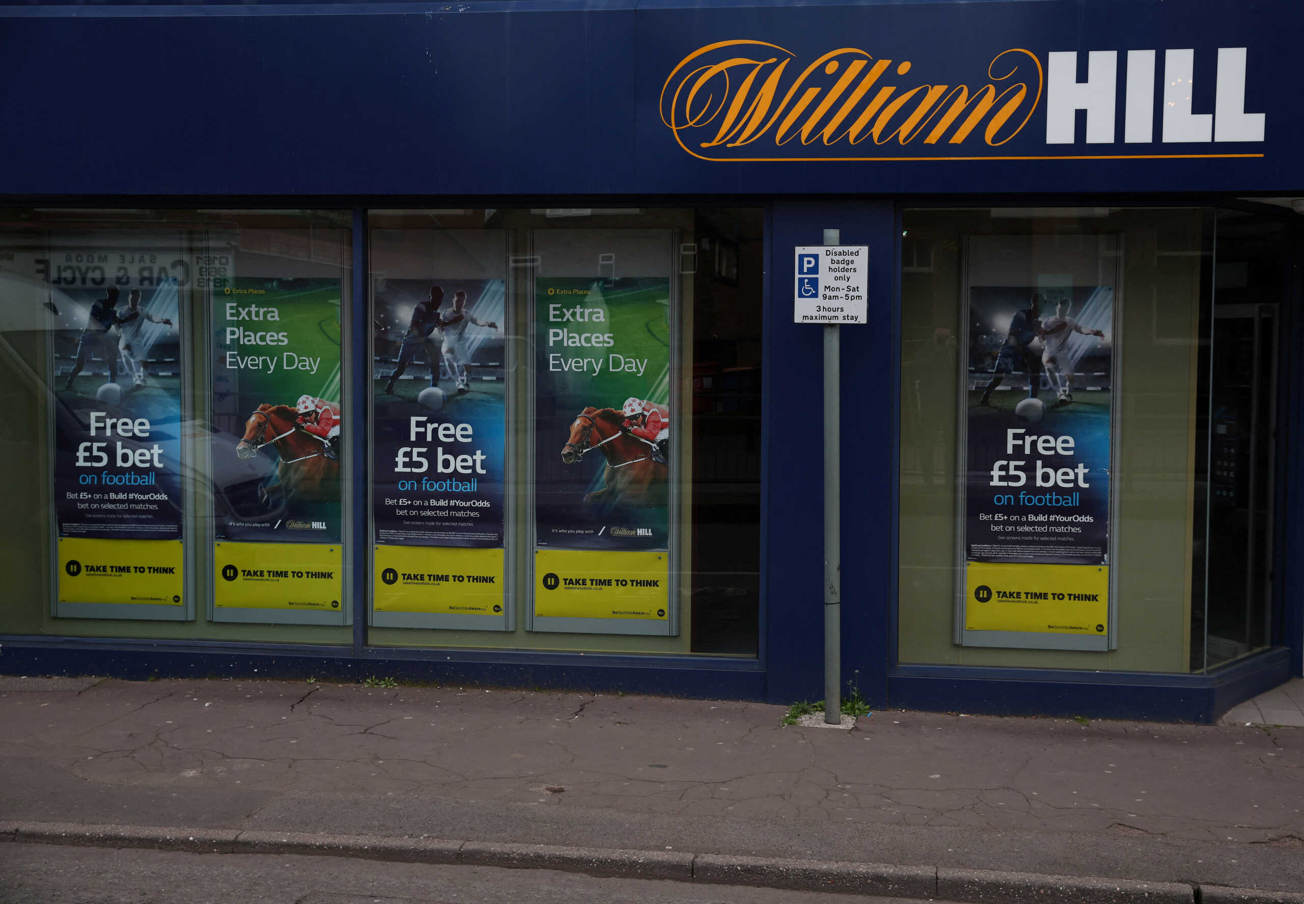 Signage is seen outside a William Hill betting shop in Manchester, Britain March 28, 2023. REUTERS
