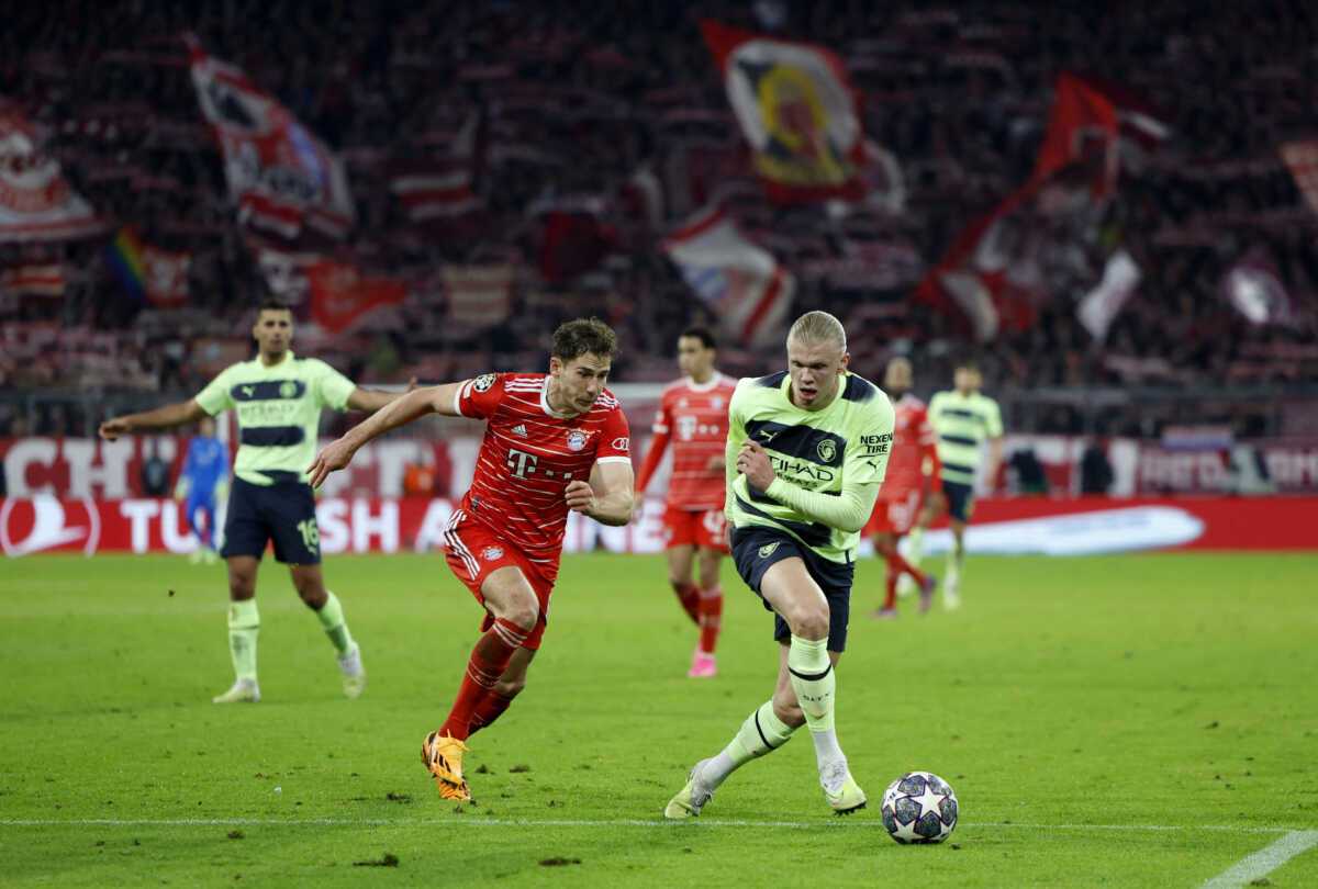 Soccer Football - Champions League - Quarter Final - Second Leg - Bayern Munich v Manchester City - Allianz Arena, Munich, Germany - April 19, 2023 Manchester City's Erling Braut Haaland in action with Bayern Munich's Leon Goretzka REUTERS
