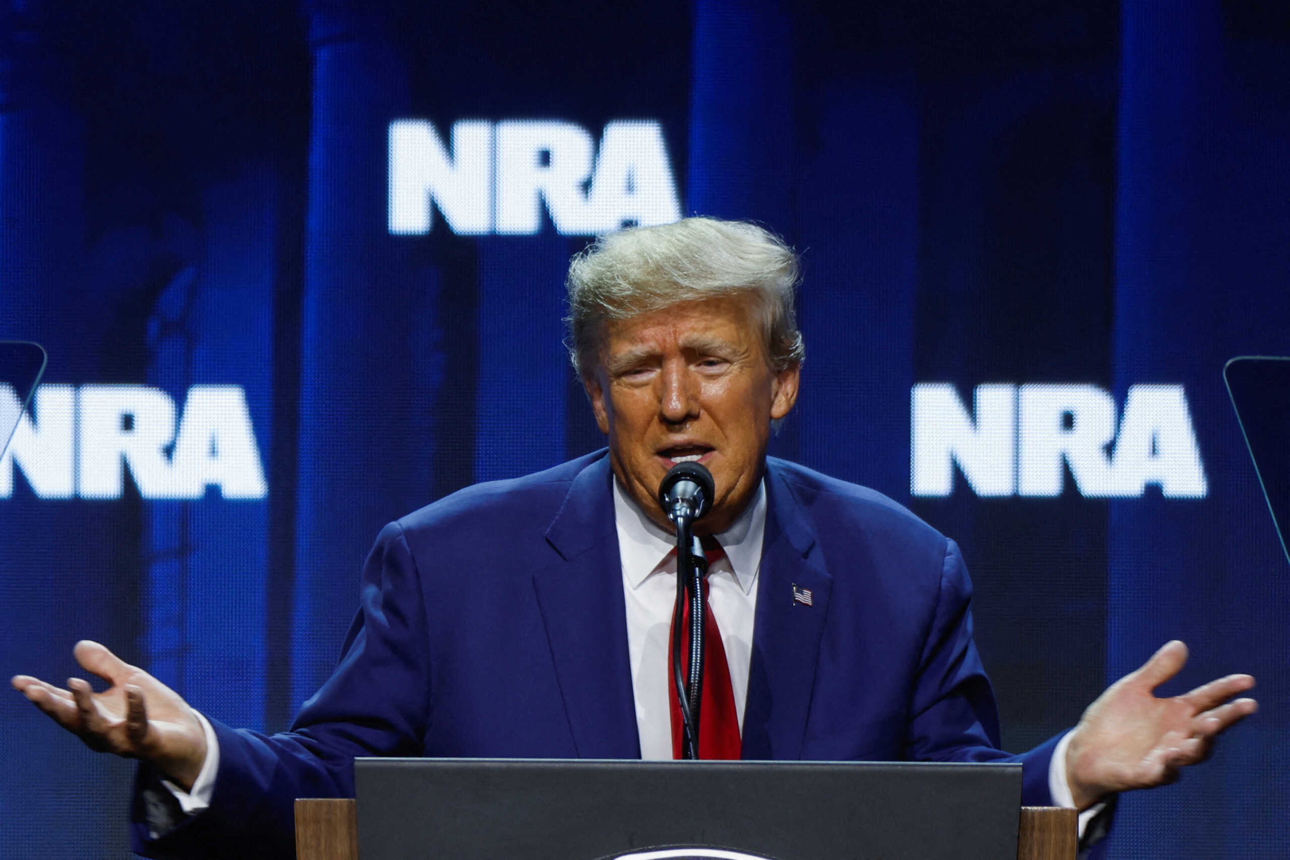 FILE PHOTO: Former U.S. President Donald Trump speaks at the National Rifle Association (NRA) annual convention in Indianapolis, Indiana, U.S., April 14, 2023. REUTERS