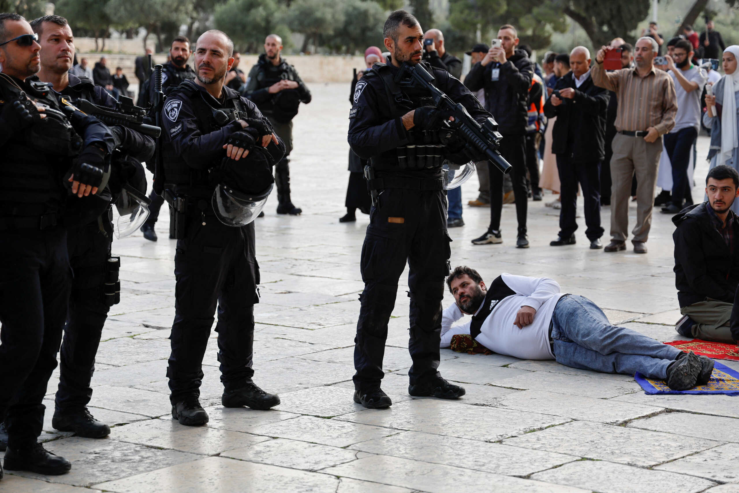Members of the Israeli security forces stand guard at the Al-Aqsa compound, also known to Jews as the Temple Mount, while tension arises during clashes in Jerusalem's Old City, April 9, 2023. REUTERS