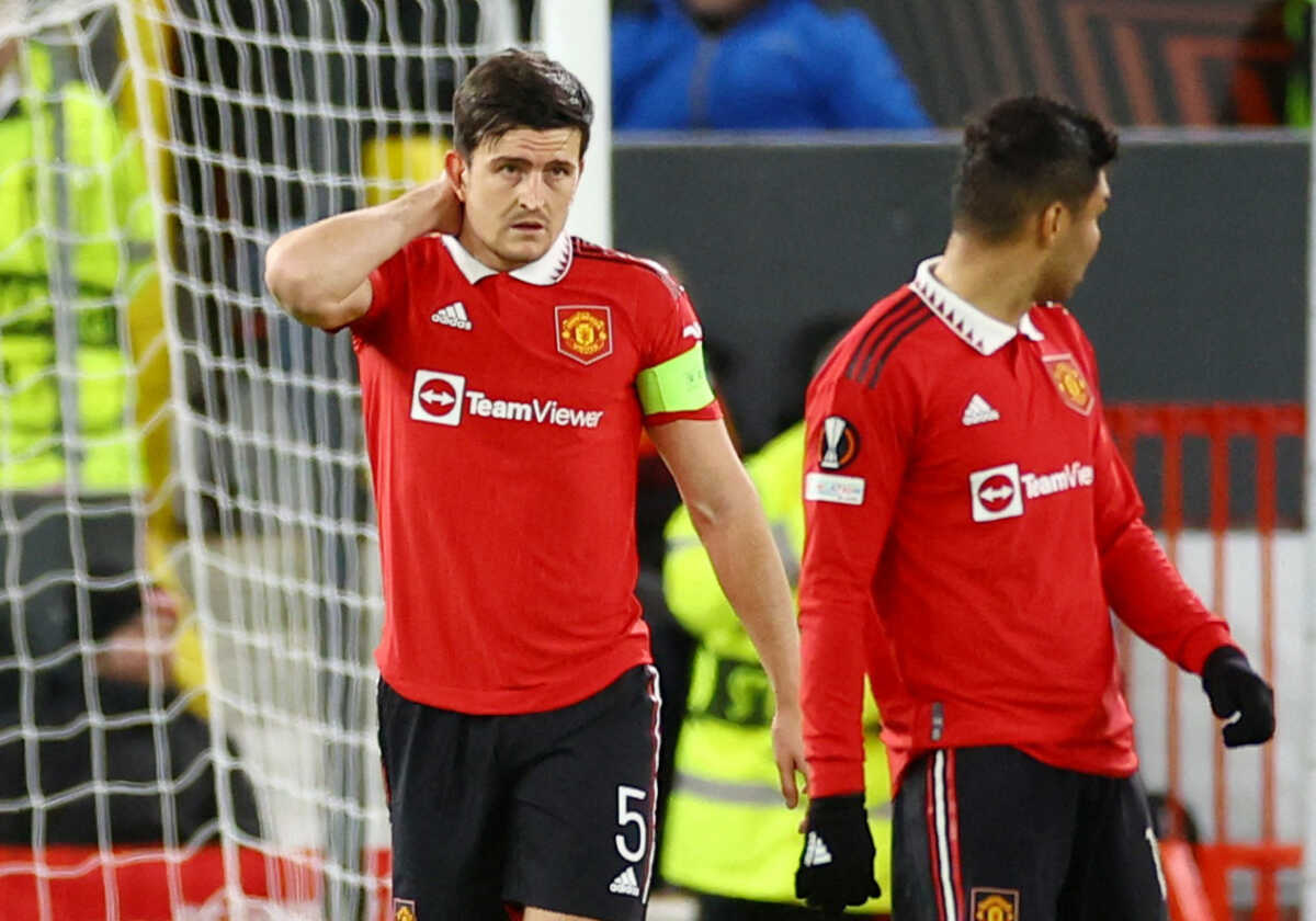 Soccer Football - Europa League - Quarter Final - First Leg - Manchester United v Sevilla - Old Trafford, Manchester, Britain - April 13, 2023  Manchester United's Harry Maguire reacts after scoring an own goal and Sevilla's second REUTERS