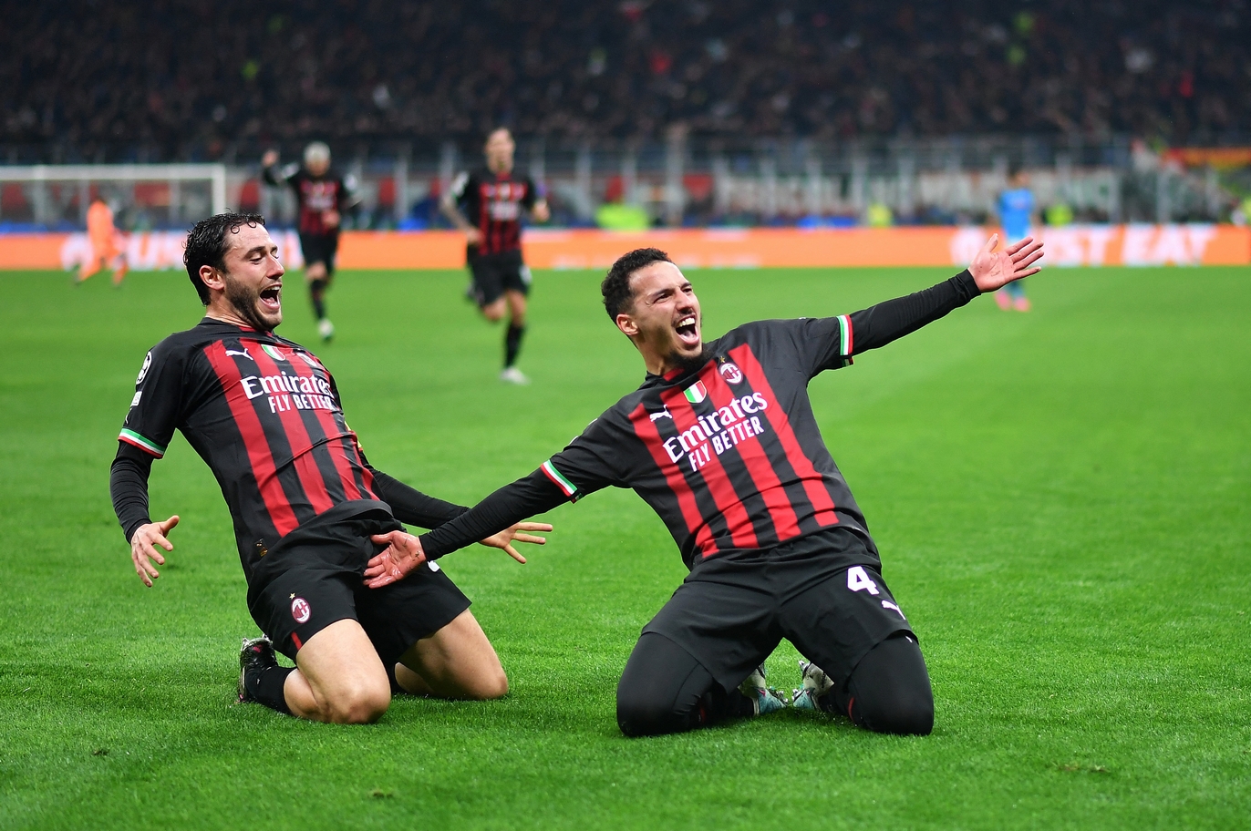Soccer Football - Champions League - Quarter Finals - First Leg - AC Milan v Napoli - San Siro, Milan, Italy - April 12, 2023 AC Milan's Ismael Bennacer celebrates scoring their first goal with Davide Calabria REUTERS