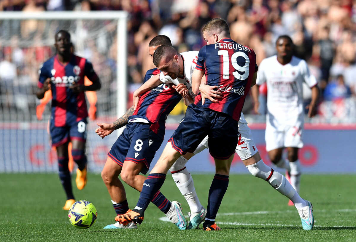Soccer Football - Serie A - Bologna v AC Milan - Stadio Renato Dall'Ara, Bologna, Italy - April 15, 2023  AC Milan's Ante Rebic in action with Bologna's Nicolas Dominguez and Lewis Ferguson REUTERS
