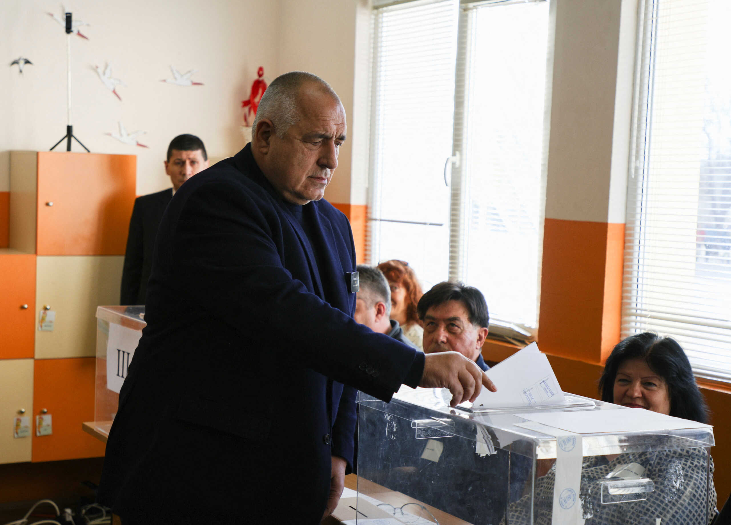 Boyko Borissov, former Bulgarian Prime Minister and leader of centre-right GERB party, casts his vote during the parliamentary election, in Sofia, Bulgaria, April 2, 2023. REUTERS