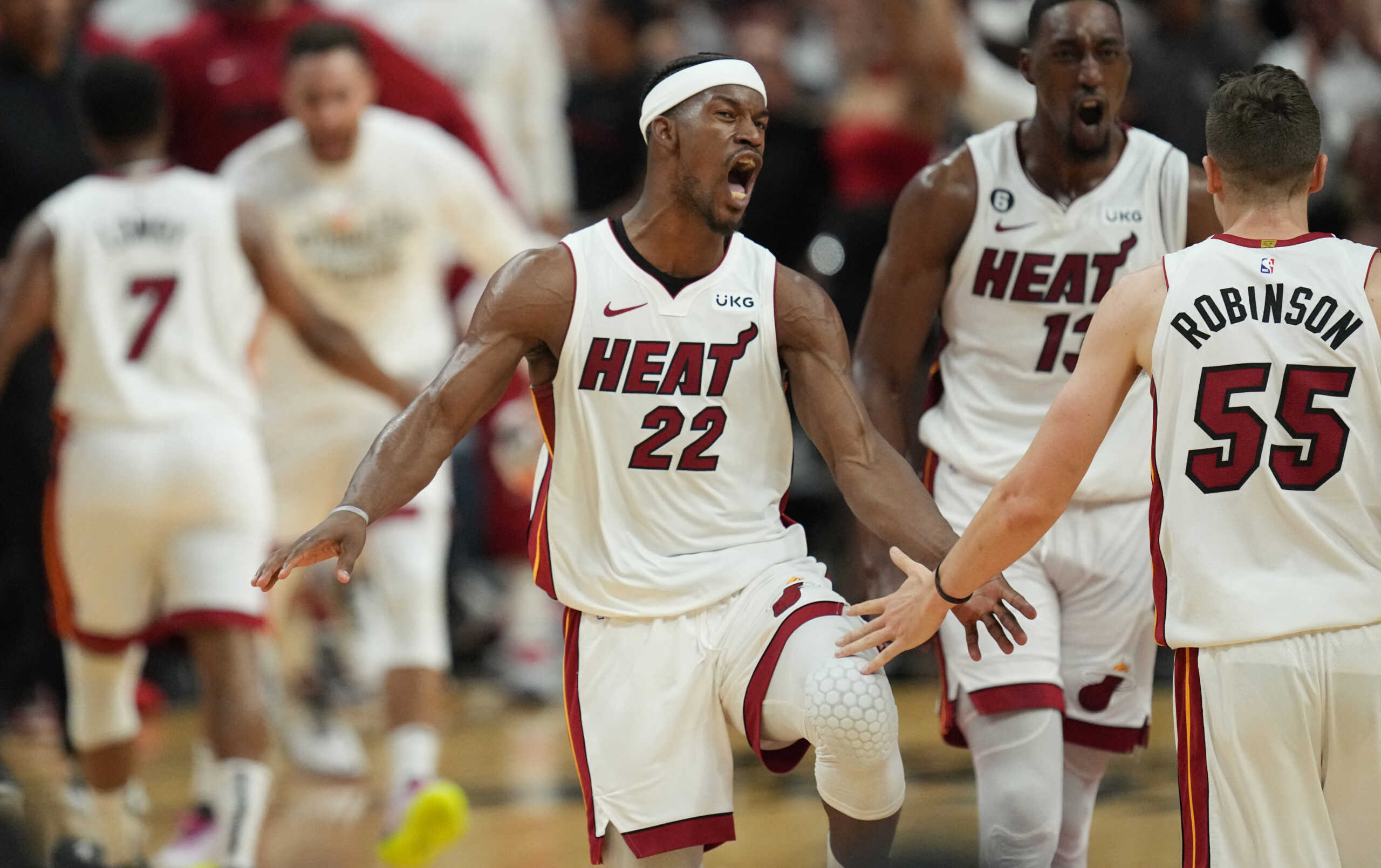 Apr 24, 2023; Miami, Florida, USA; Miami Heat forward Jimmy Butler (22) celebrates after making a shot against the Milwaukee Bucks in the fourth quarter during game four of the 2023 NBA Playoffs at Kaseya Center. Mandatory Credit: Jim Rassol-USA TODAY Sports