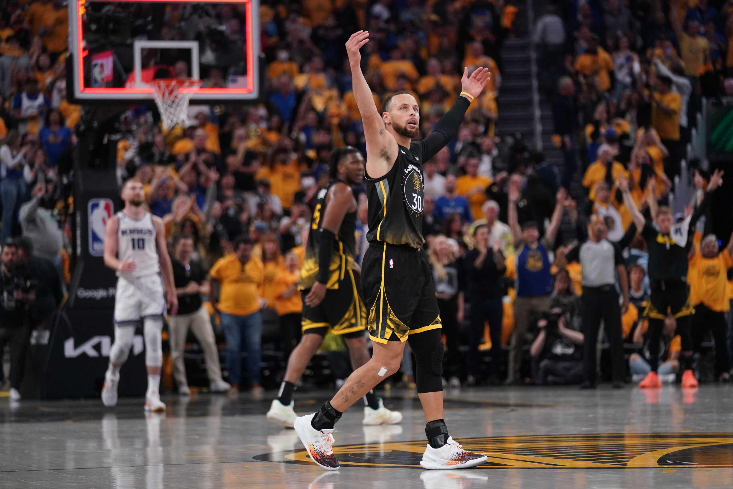 Apr 20, 2023; San Francisco, California, USA; Golden State Warriors guard Stephen Curry (30) reacts after making a three point basket against the Sacramento Kings in the second quarter during game three of the 2023 NBA playoffs at the Chase Center. Mandatory Credit: Cary Edmondson-USA TODAY Sports