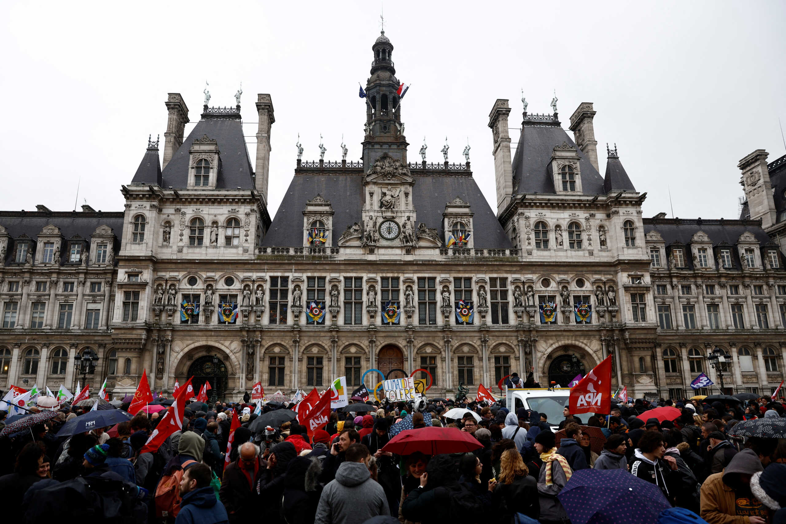 Protesters gather in front of the Paris City Hall after the Constitutional Council (Conseil Constitutionnel) approved most of the French government's pension reform, in Paris, France, April 14, 2023. REUTERS