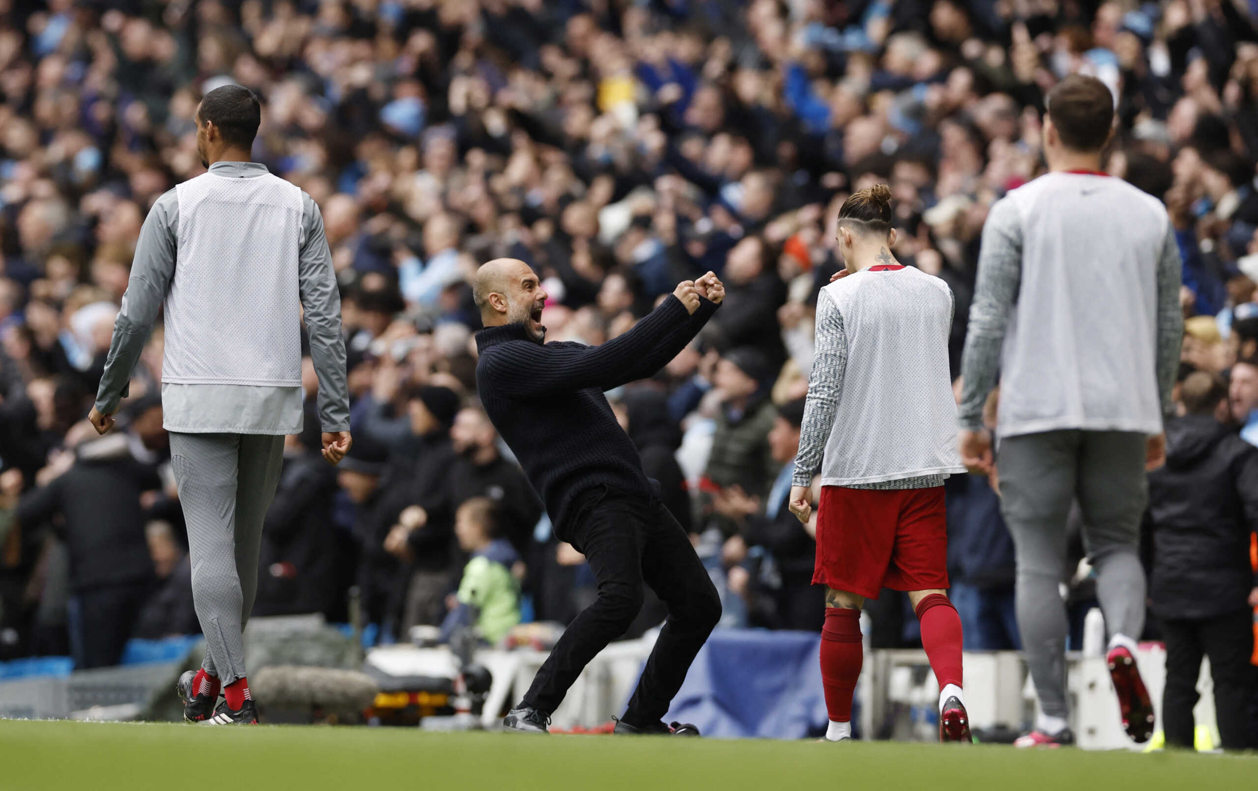 Soccer Football - Premier League - Manchester City v Liverpool - Etihad Stadium, Manchester, Britain - April 1, 2023  Manchester City manager Pep Guardiola celebrates their first goal scored by Julian Alvarez Action Images via Reuters