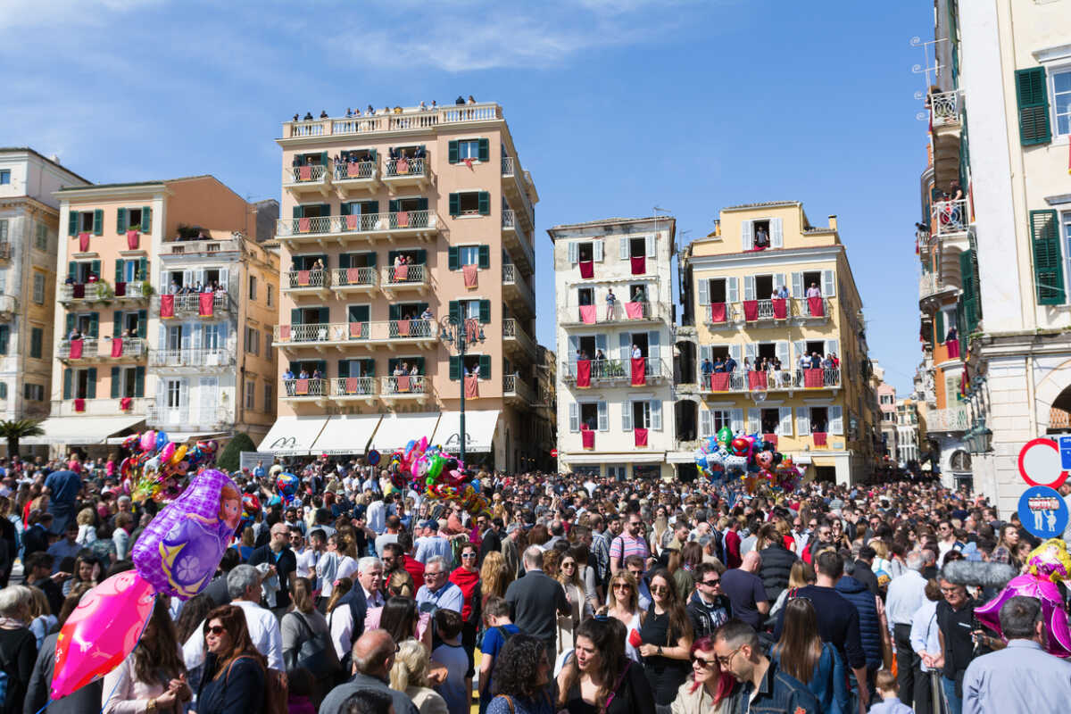Corfu, Greece - April 7, 2018: Corfians throw clay pots from windows and balconies on Holy Saturday to celebrate the Resurrection of Christ. Easter pot smashing