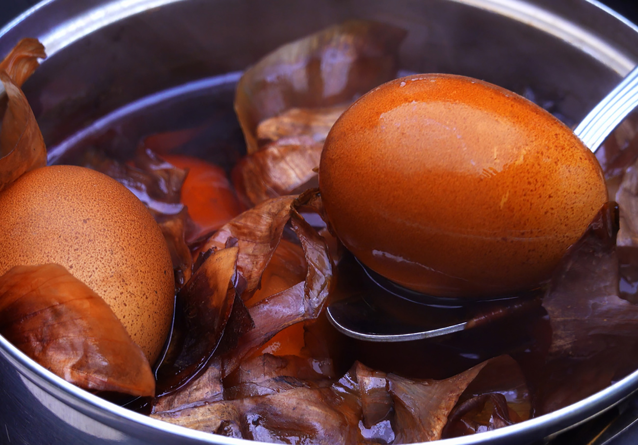 Traditional Way of Dyeing Easter Eggs by Boiling in Peeled Onion Skin