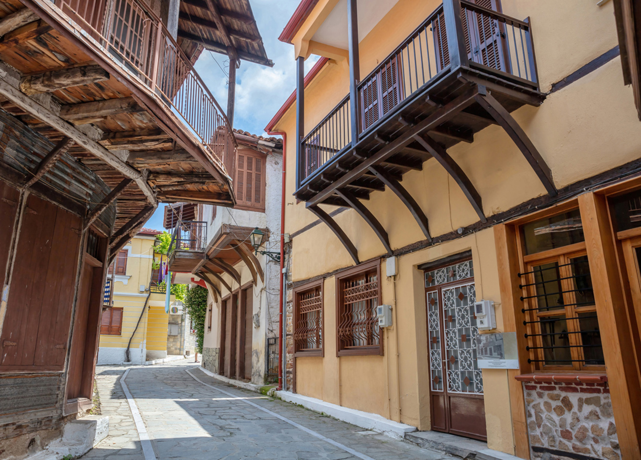 Macedonia Greece, Arnaia village Halkidiki. House with traditional Macedonian architecture. Under view of mansion with loggia, tile roof, covered balcony
