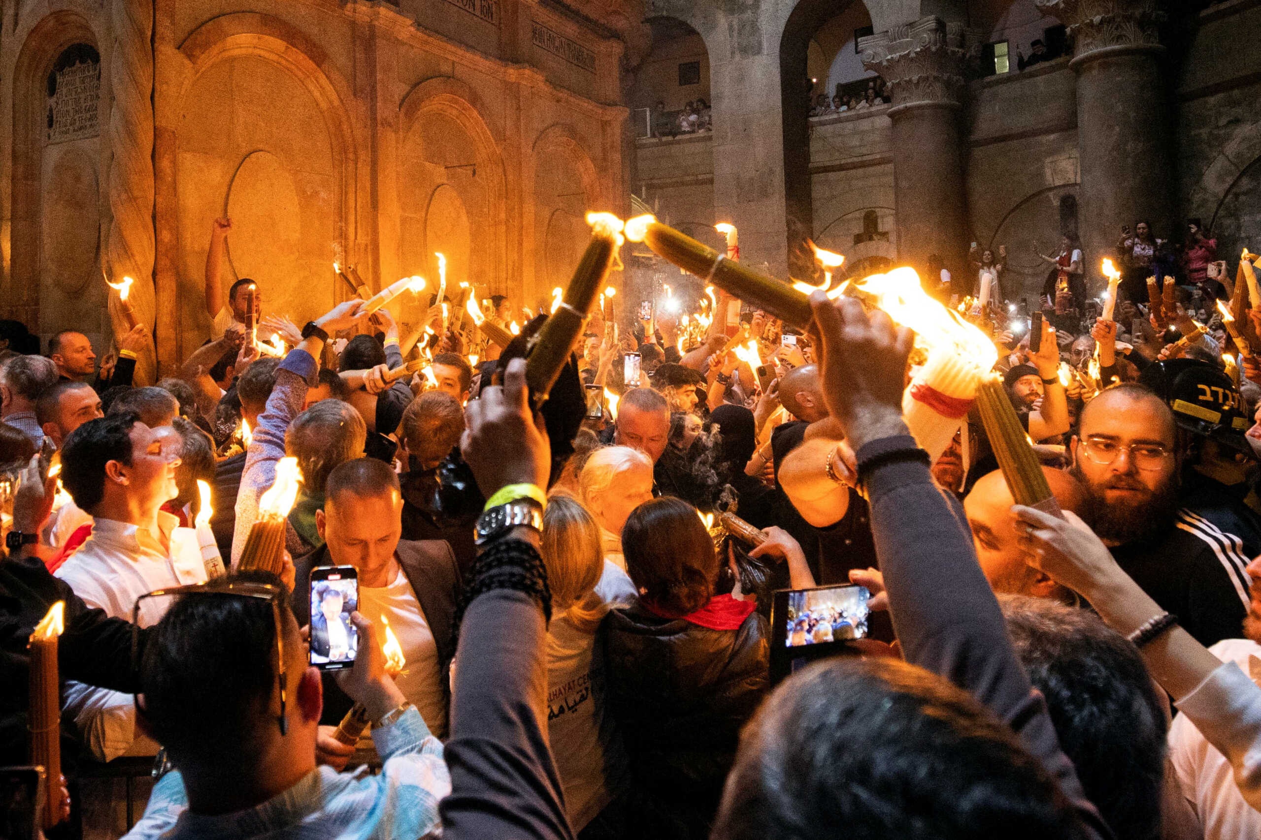 Orthodox Christian worshippers attend the Holy Fire ceremony at the Church of the Holy Sepulchre in Jerusalem's Old City, April 15, 2023. REUTERS