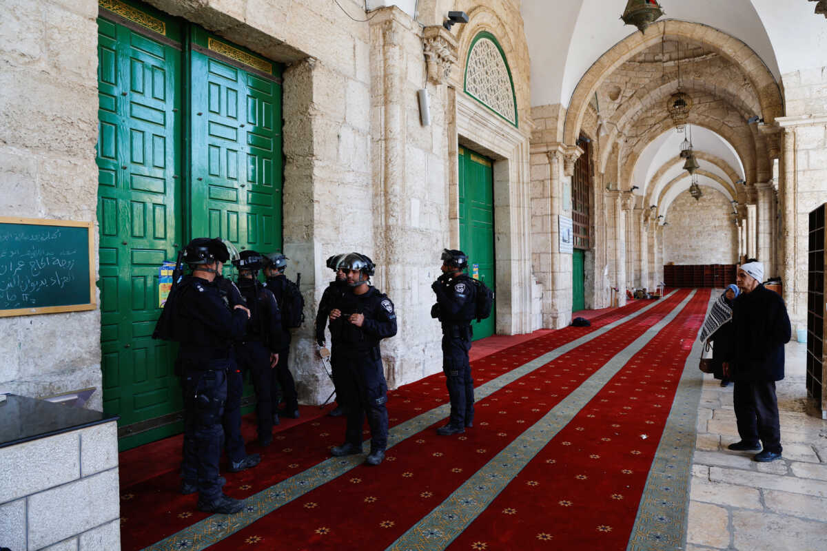 Israeli border police work at Al-Aqsa mosque, also known to Jews as the Temple Mount, while tension arises during clashes with Palestinians in Jerusalem's Old City, April 5, 2023. REUTERS