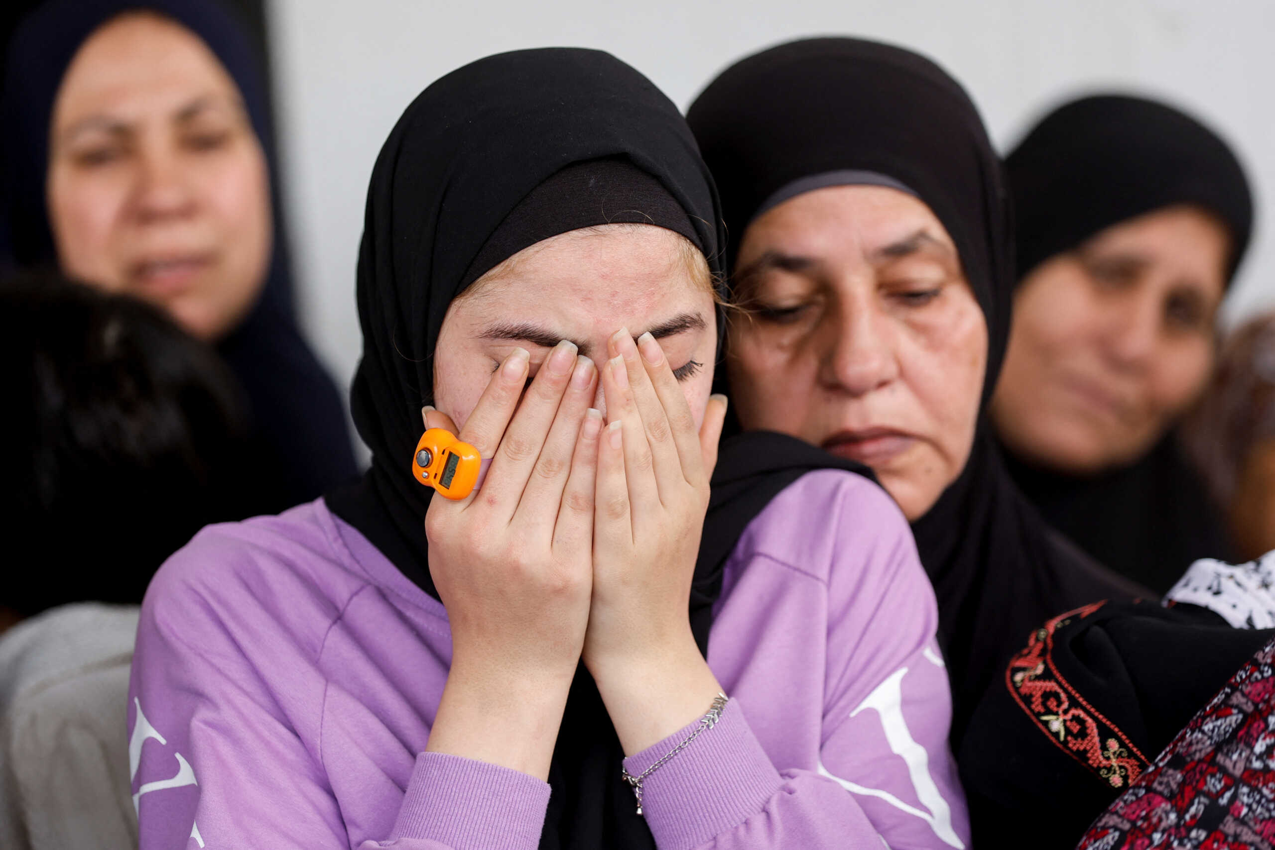Relatives mourn during the funeral of a Palestinian who was killed during an Israeli raid, during his funeral near Jericho in the Israeli-Occupied West Bank, April 10, 2023. REUTERS
