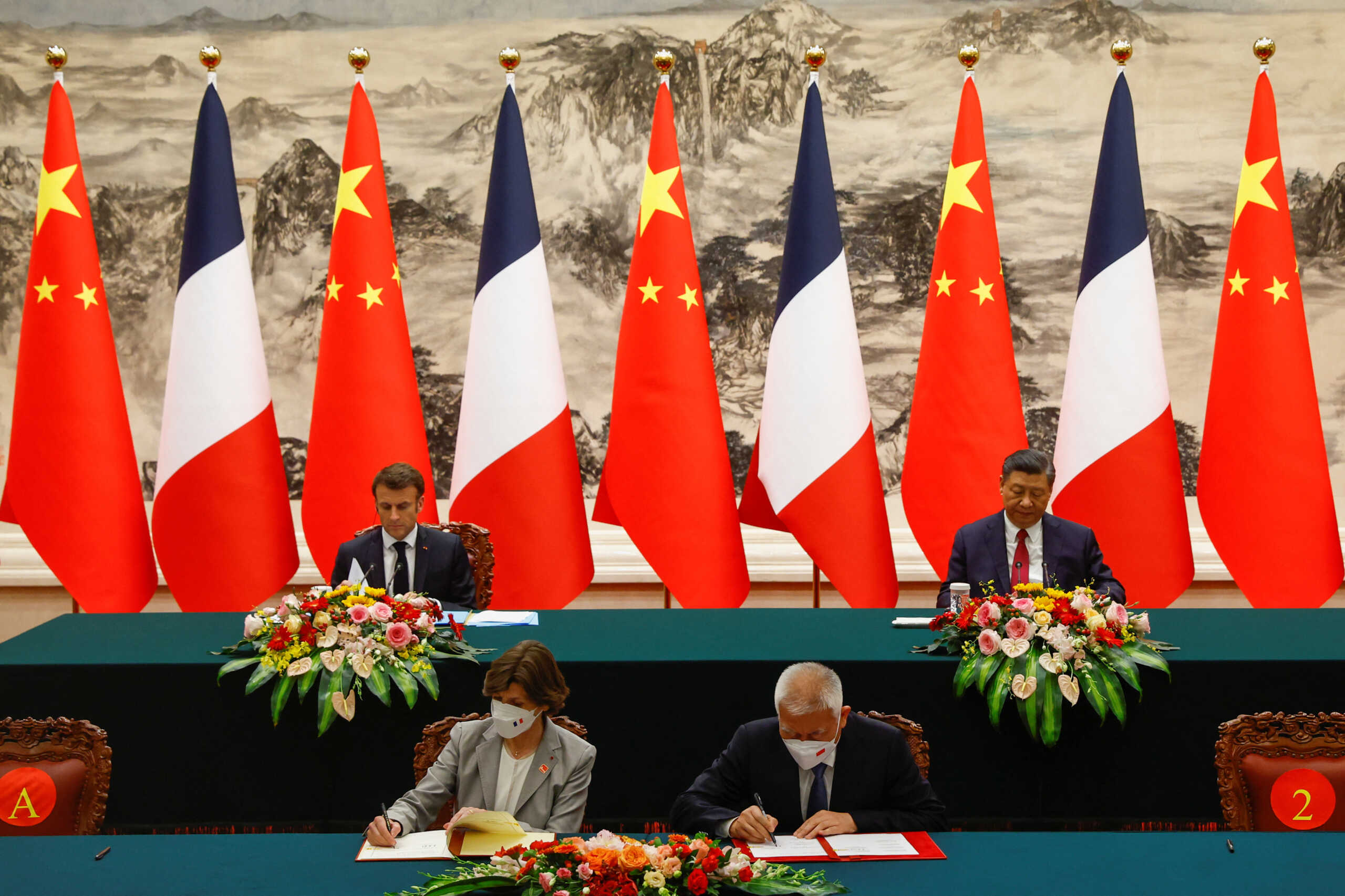 Chinese President Xi Jinping and French President Emmanuel Macron attend a signing ceremony at the Great Hall of the People, in Beijing, China, April 6, 2023. REUTERS