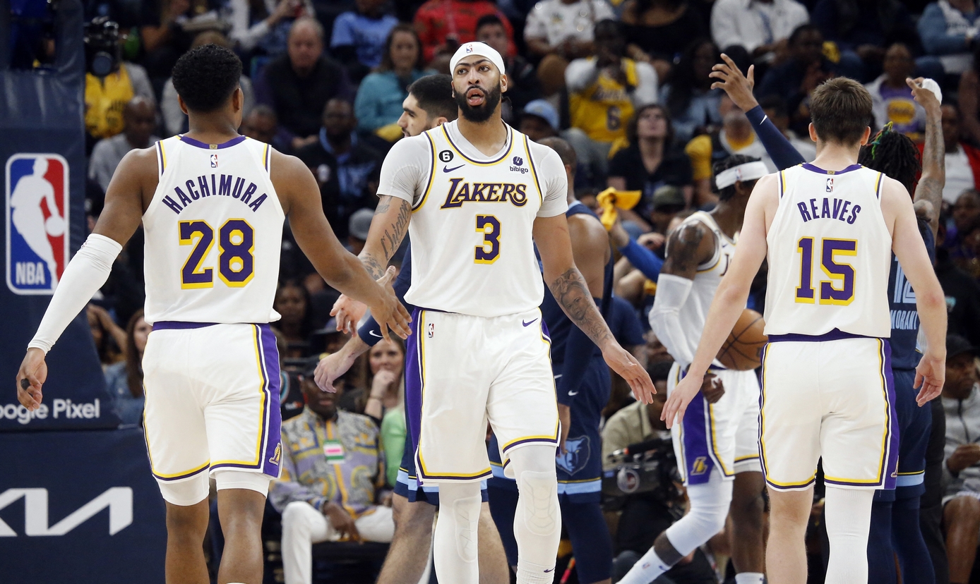 Apr 16, 2023; Memphis, Tennessee, USA; Los Angeles Lakers forward Anthony Davis (3) reacts with forward Rui Hachimura (28) and guard Austin Reaves (15) during the second half during game one of the 2023 NBA playoffs against the Memphis Grizzlies at FedExForum. Mandatory Credit: Petre Thomas-USA TODAY Sports