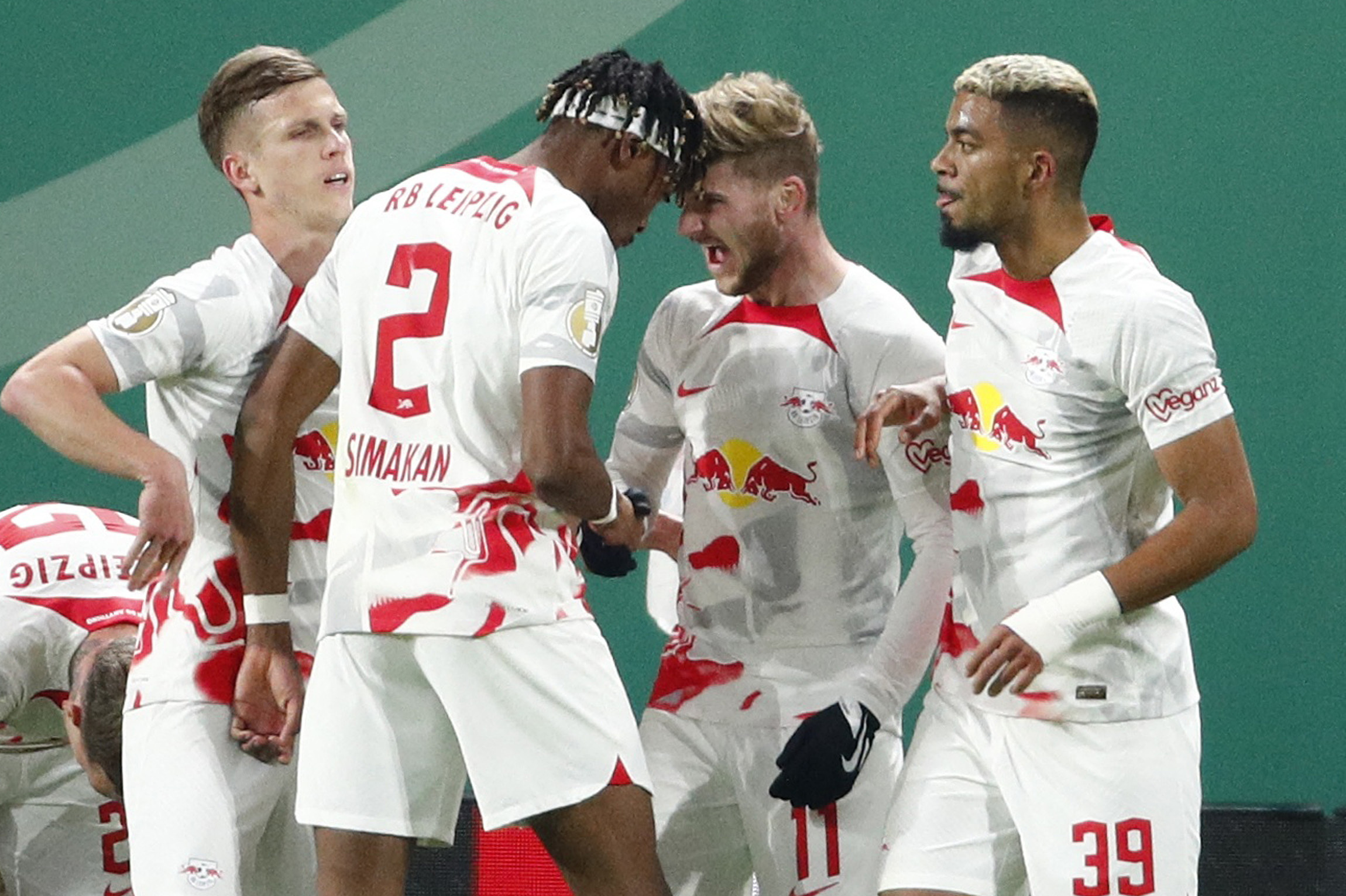 Soccer Football - DFB Cup - Quarter Final - RB Leipzig v Borrusia Dortmund - Red Bull Arena, Leipzig, Germany - April 5, 2023  RB Leipzig's Timo Werner celebrates scoring their first goal with teammates REUTERS