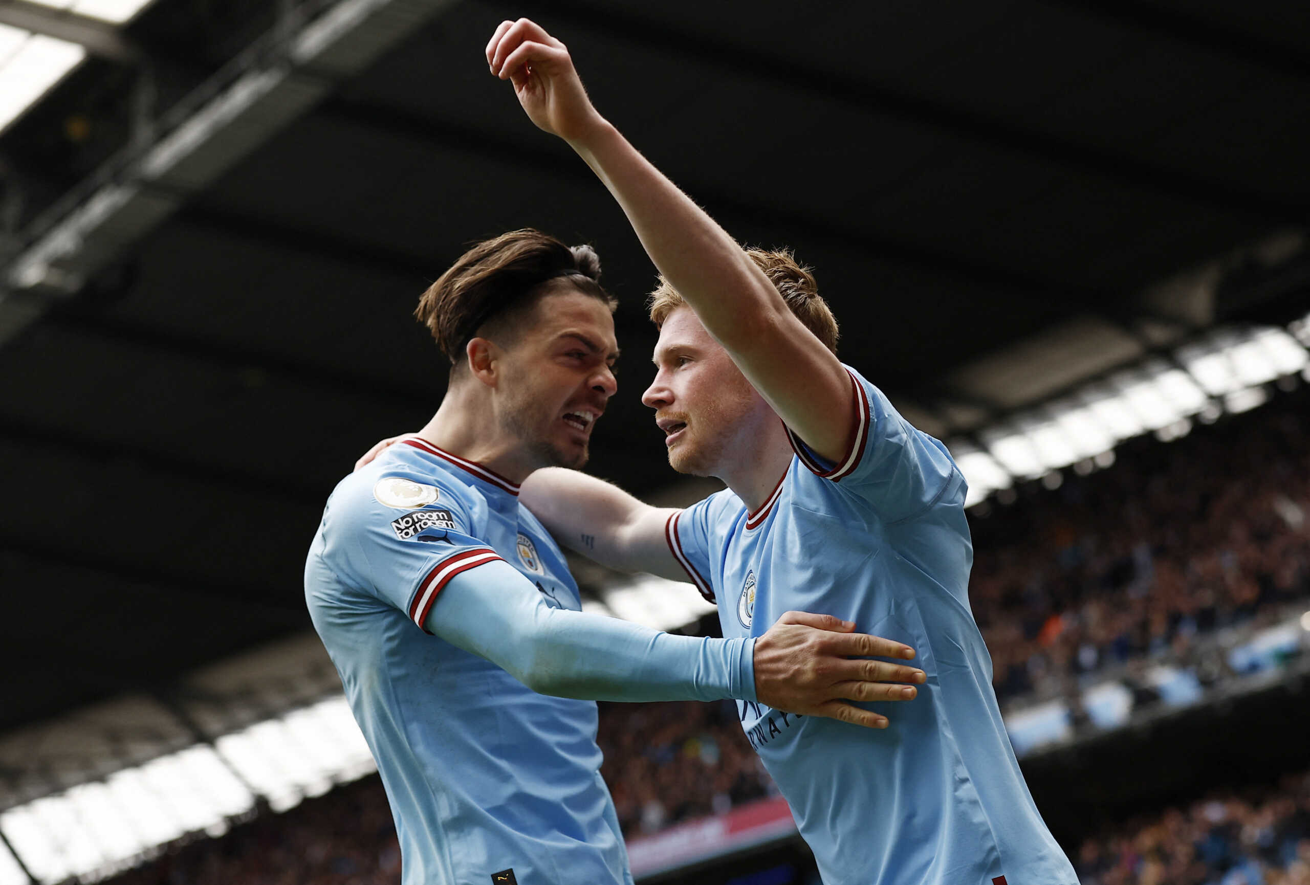 Soccer Football - Premier League - Manchester City v Liverpool - Etihad Stadium, Manchester, Britain - April 1, 2023  Manchester City's Kevin De Bruyne celebrates scoring their second goal with Jack Grealish Action Images via Reuters