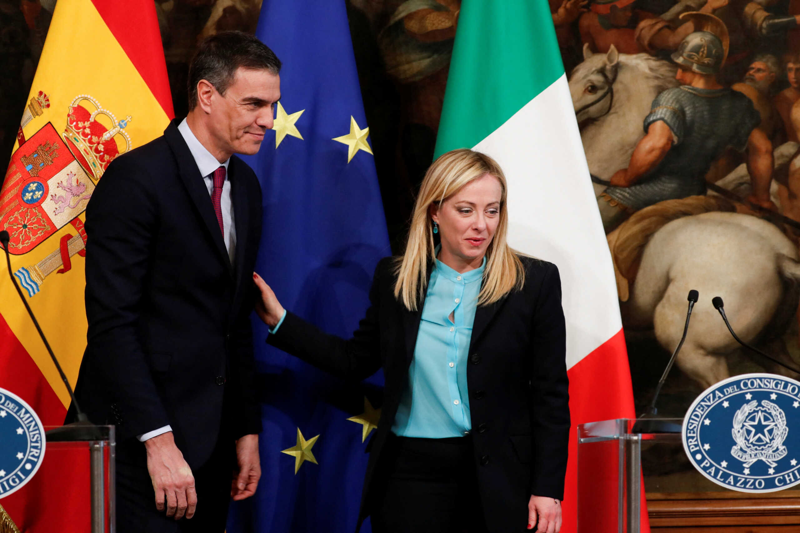 Italian Prime Minister Giorgia Meloni and Spanish Prime Minister Pedro Sanchez stand at the end of a news conference after their meeting at Palazzo Chigi, in Rome, Italy, April 5, 2023. REUTERS
