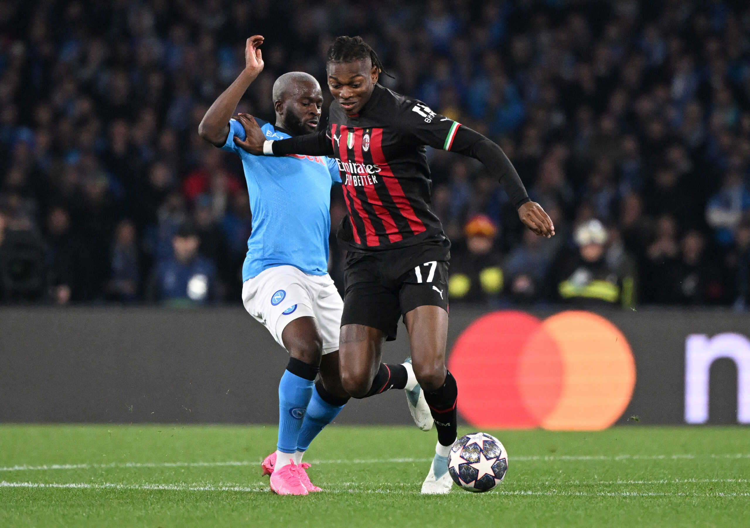 Soccer Football - Champions League - Quarter Final - Second Leg - Napoli v AC Milan - Stadio Diego Armando Maradona, Naples, Italy - April 18, 2023 AC Milan's Rafael Leao in action with Napoli's Tanguy Ndombele REUTERS