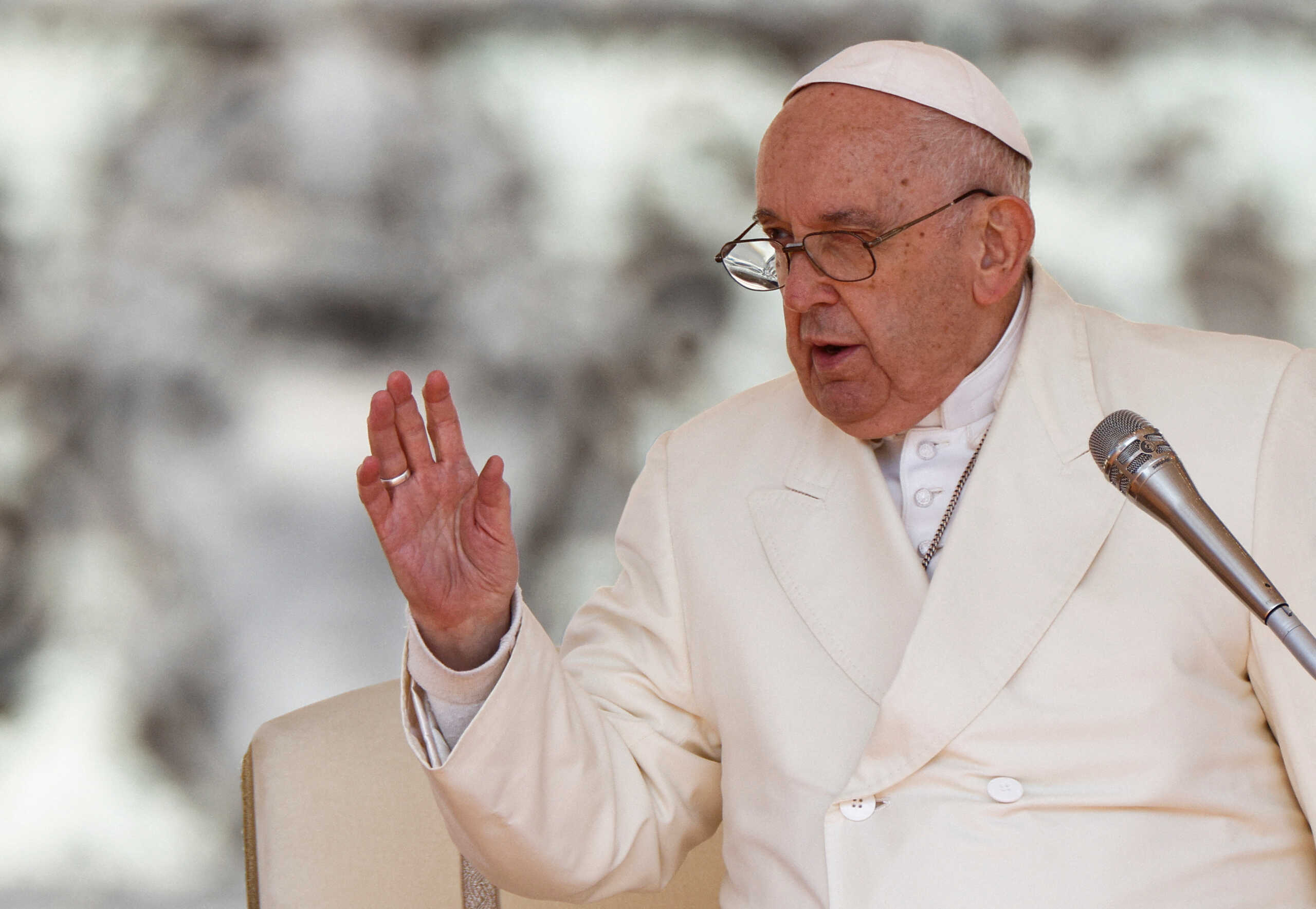 FILE PHOTO: Pope Francis speaks as he attends the weekly general audience in St. Peter's Square at the Vatican, April 19, 2023. REUTERS