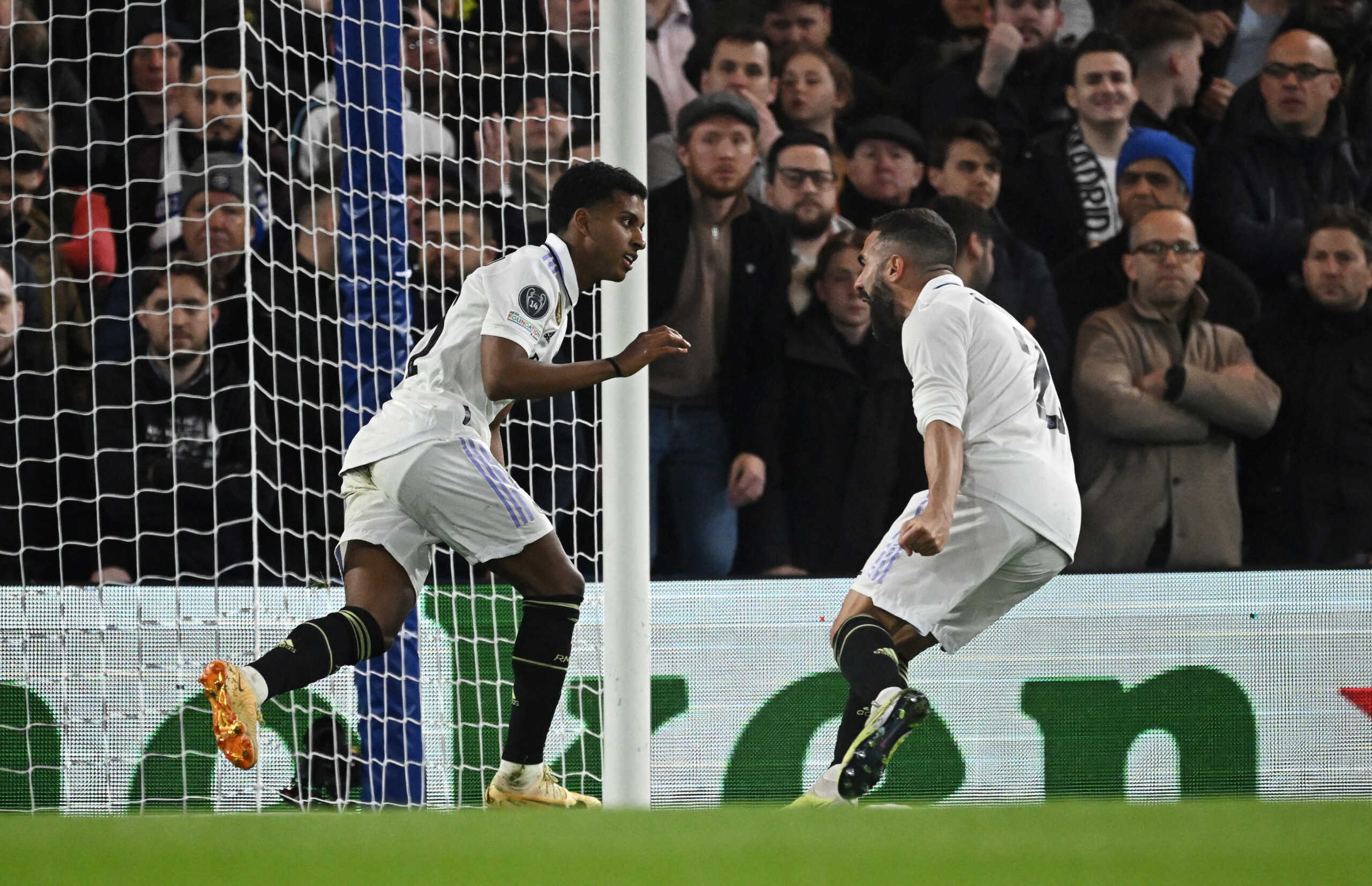 Soccer Football - Champions League - Quarter Final - Second Leg - Chelsea v Real Madrid - Stamford Bridge, London, Britain - April 18, 2023 Real Madrid's Rodrygo celebrates scoring their first goal with Dani Carvajal REUTERS