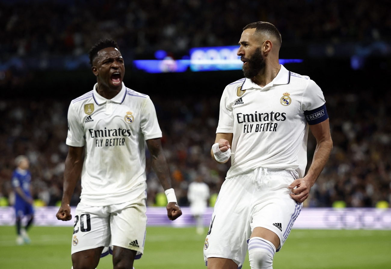 Soccer Football - Champions League - Quarter Finals - First Leg - Real Madrid v Chelsea - Santiago Bernabeu, Madrid, Spain - April 12, 2023 Real Madrid's Karim Benzema celebrates scoring their first goal with Vinicius Junior REUTERS