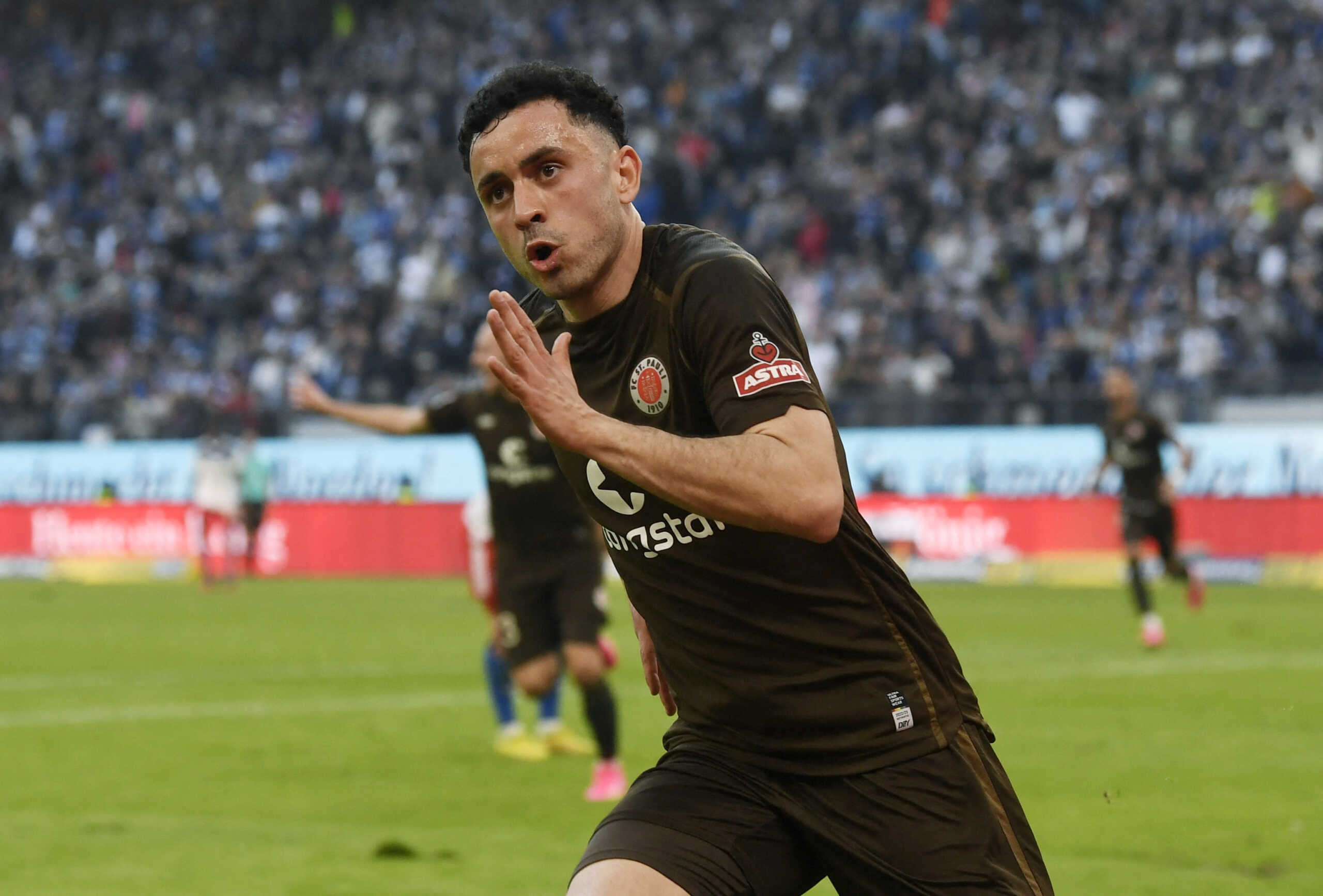 Soccer Football - 2. Bundesliga - Hamburger SV v St. Pauli - Volksparkstadion, Hamburg, Germany - April 21, 2023 St. Pauli's Manolis Saliakas celebrates scoring their first goal REUTERS
