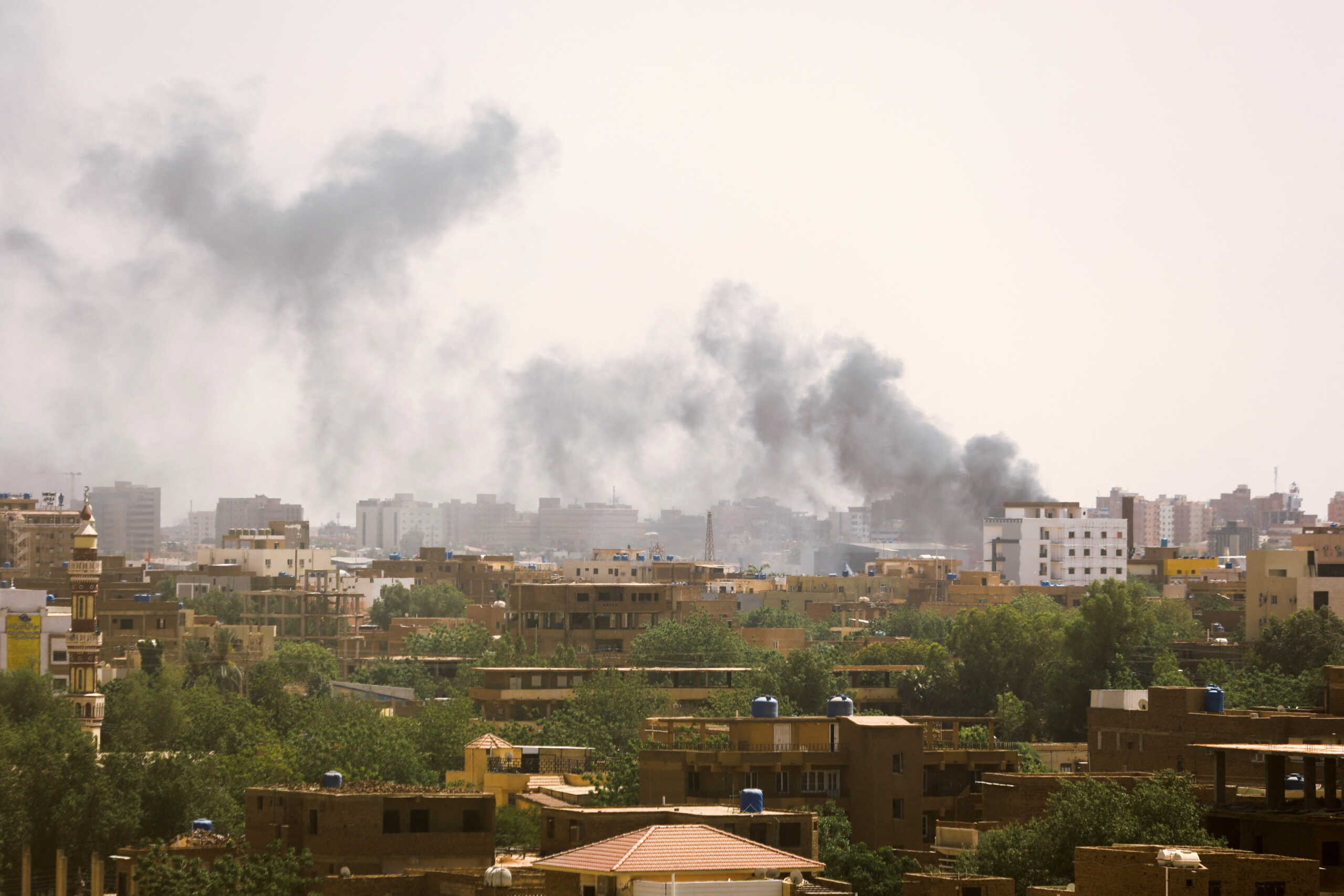 Smoke rises over buildings during clashes between the paramilitary Rapid Support Forces and the army in Khartoum, Sudan April 17, 2023. REUTERS