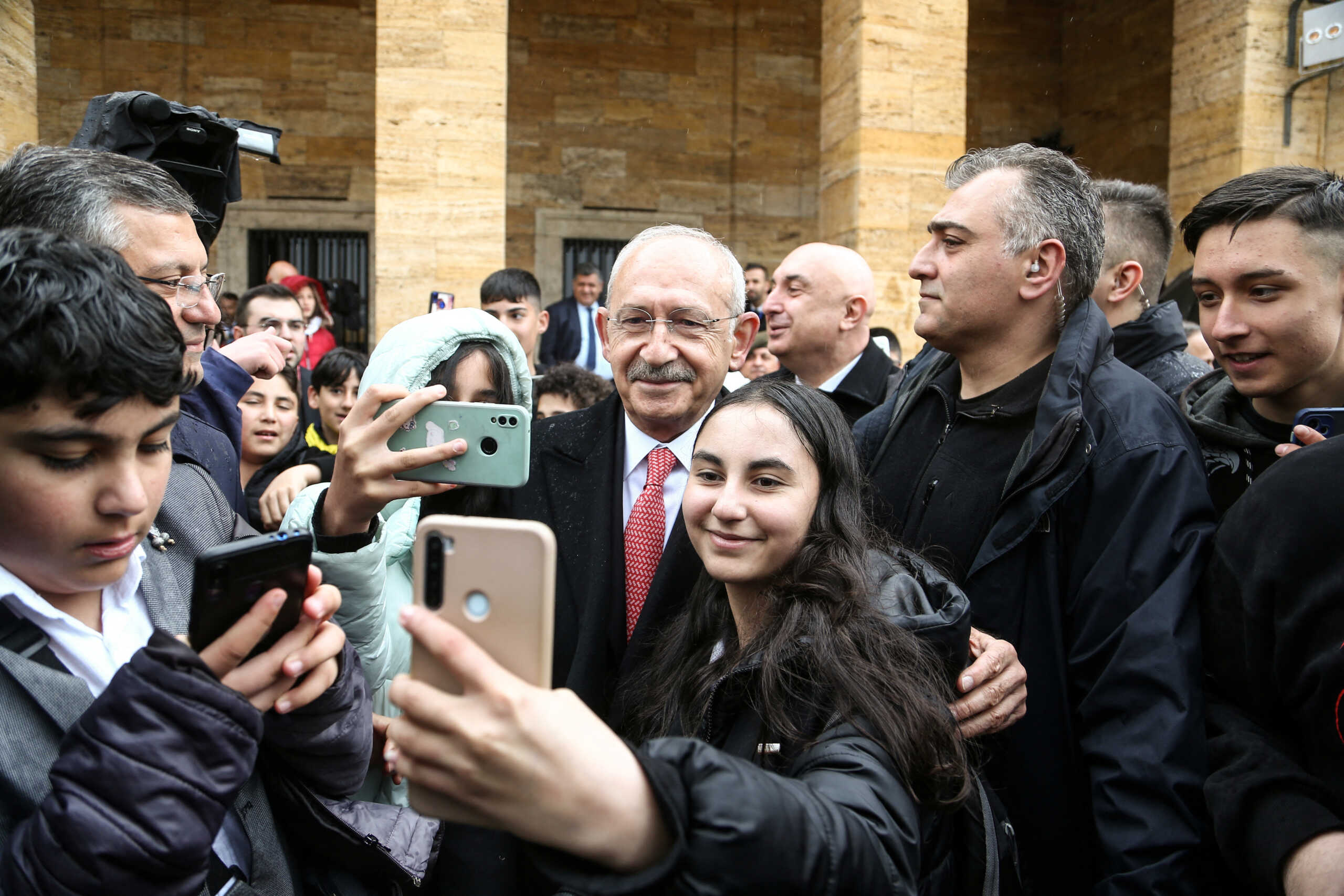 Kemal Kilicdaroglu, head of Turkey's main opposition Republican People's Party (CHP) and the presidential candidate of the main opposition alliance for the upcoming May elections, poses for selfies, as he visits the mausoleum of Mustafa Kemal Ataturk, founder of modern Turkey, during a ceremony to mark National Sovereignty and Child's Day in Ankara, Turkey, April 23, 2023. REUTERS