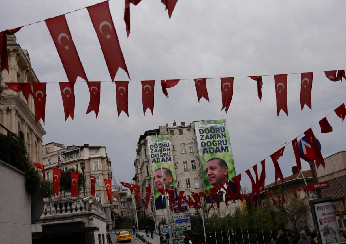 Billboards carrying pictures of Turkish President Tayyip Erdogan and a slogan that reads "For Turkey century; right time, right man" are seen on a building ahead of the May 14 presidential and parliamentary elections, in Istanbul, Turkey April 18, 2023. REUTERS