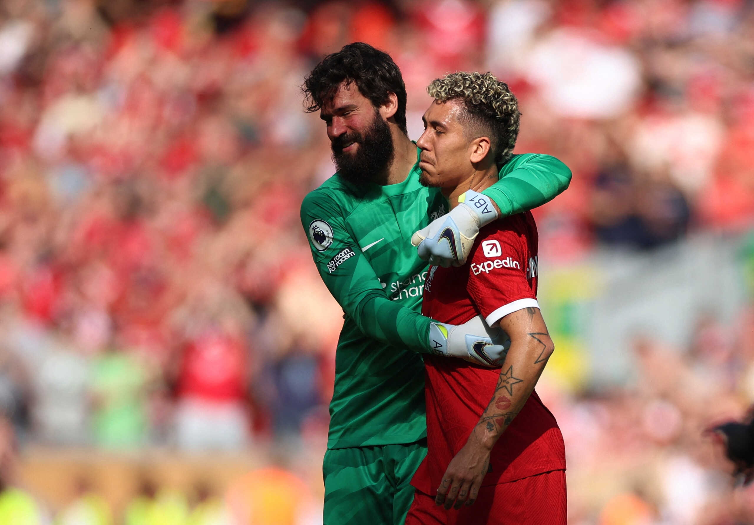 Soccer Football - Premier League - Liverpool v Aston Villa - Anfield, Liverpool, Britain - May 20, 2023 Liverpool's Roberto Firmino with Alisson after the match REUTERS