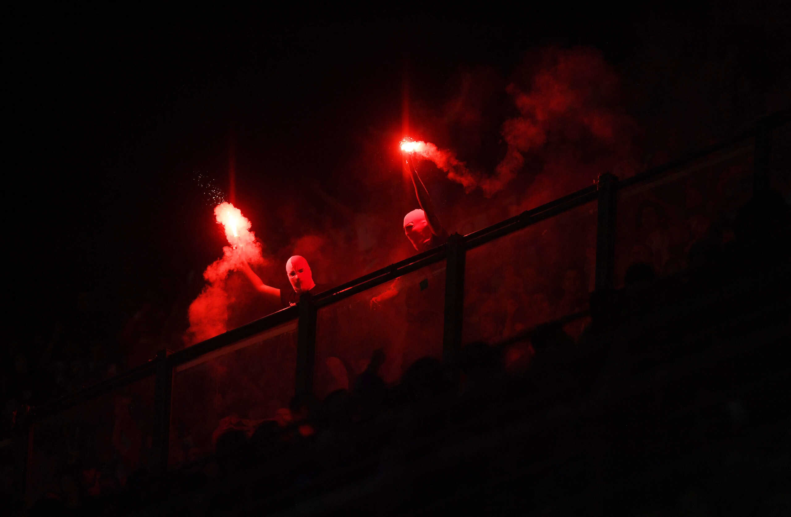 Soccer Football - Champions League - Quarter Final - Second Leg - Inter Milan v Benfica - San Siro, Milan, Italy - April 19, 2023 Benfica fans with flares in the stands during the match REUTERS