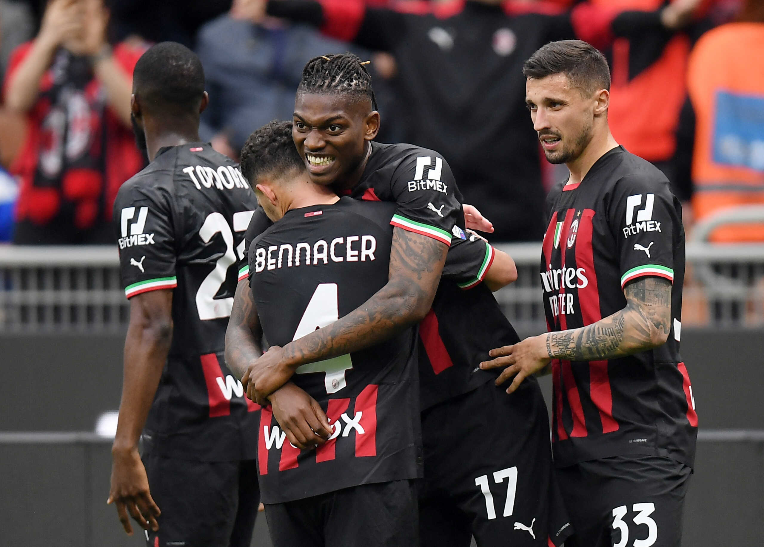 Soccer Football - Serie A - AC Milan v Lecce - San Siro, Milan, Italy - April 23, 2023 AC Milan's Rafael Leao celebrates scoring their second goal with Ismael Bennacer REUTERS