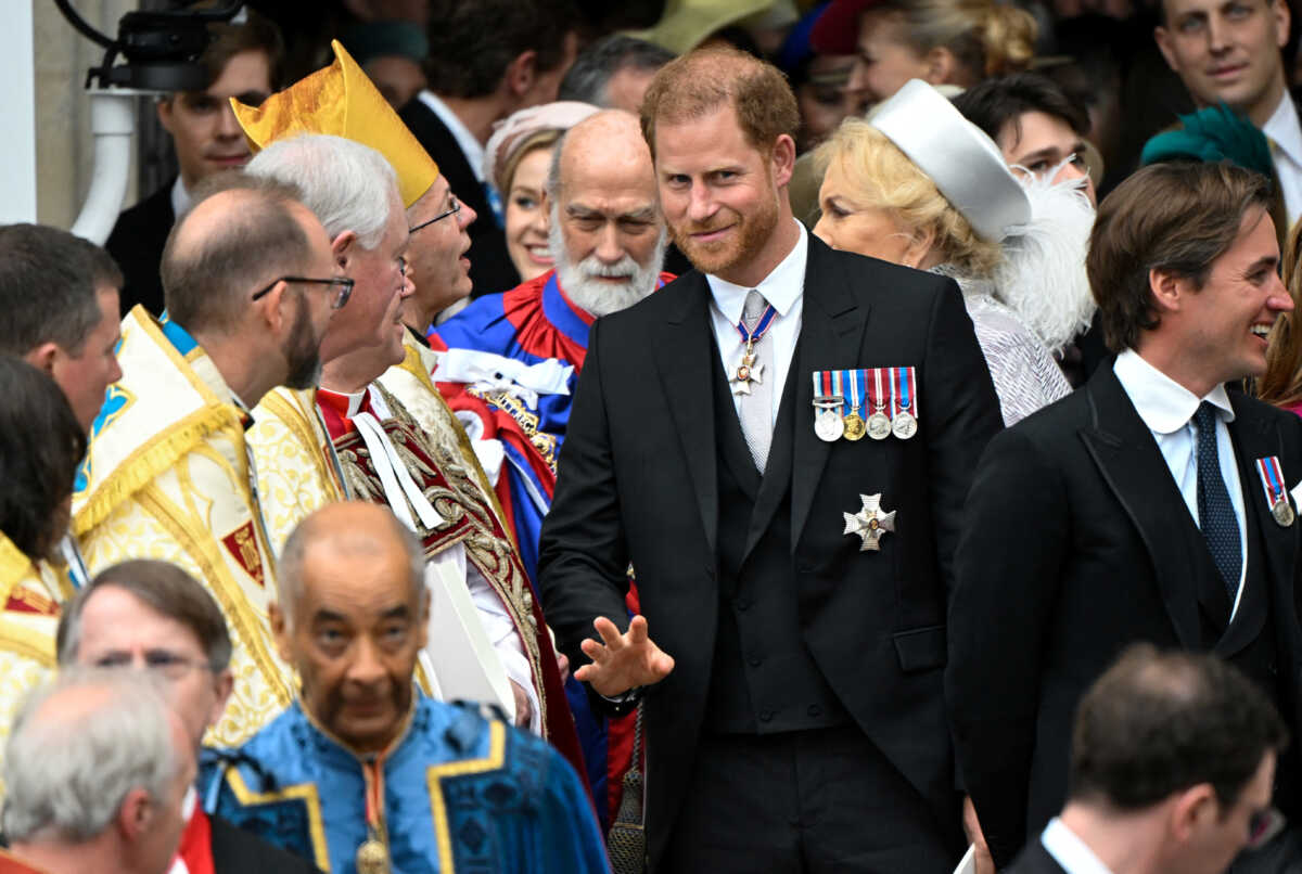Britain's Prince Harry, Duke of Sussex,  leaves Westminster Abbey following the coronation ceremony of Britain's King Charles and Queen Camilla, in London, Britain May 6, 2023. REUTERS