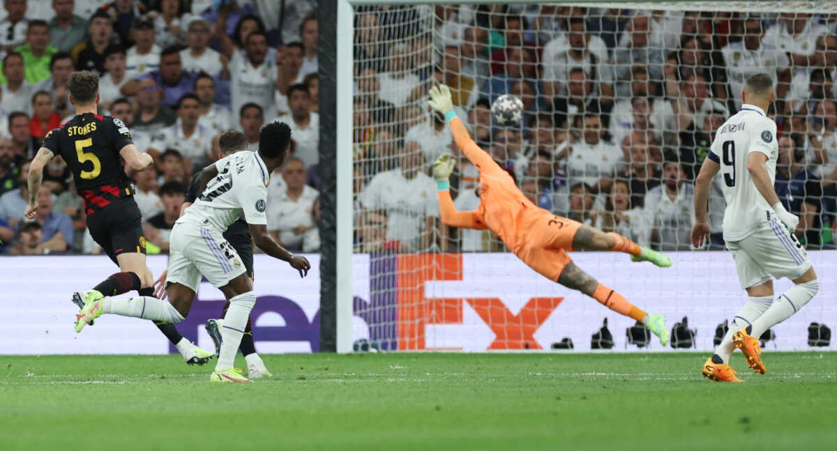 Soccer Football - Champions League - Semi Final - First Leg - Real Madrid v Manchester City - Santiago Bernabeu, Madrid, Spain - May 9, 2023 Real Madrid's Vinicius Junior scores their first goal REUTERS