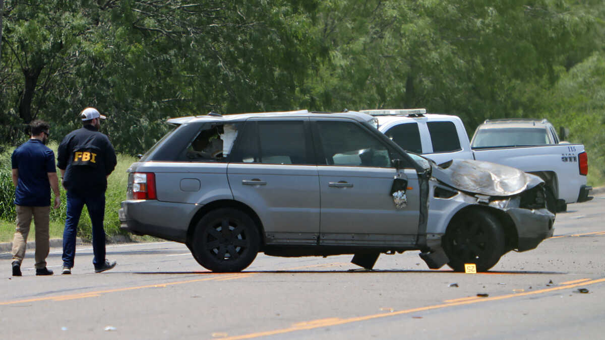 Law enforcement officers investigate the scene after a deadly incident where a car ran into pedestrians near Ozanam Center, a shelter for migrants and homeless, in Brownsville, Texas, U.S. May 7, 2023.  REUTERS