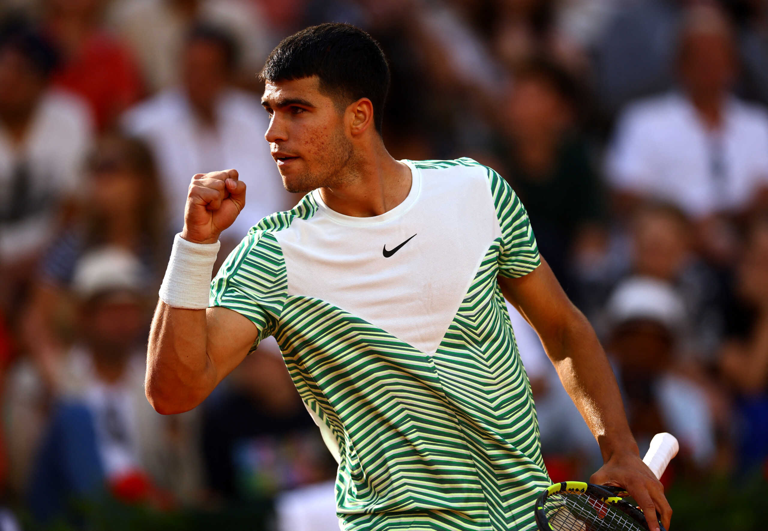 Tennis - French Open - Roland Garros, Paris, France - May 29, 2023 Spain's Carlos Alcaraz reacts during his first round match against Italy's Flavio Cobolli REUTERS
