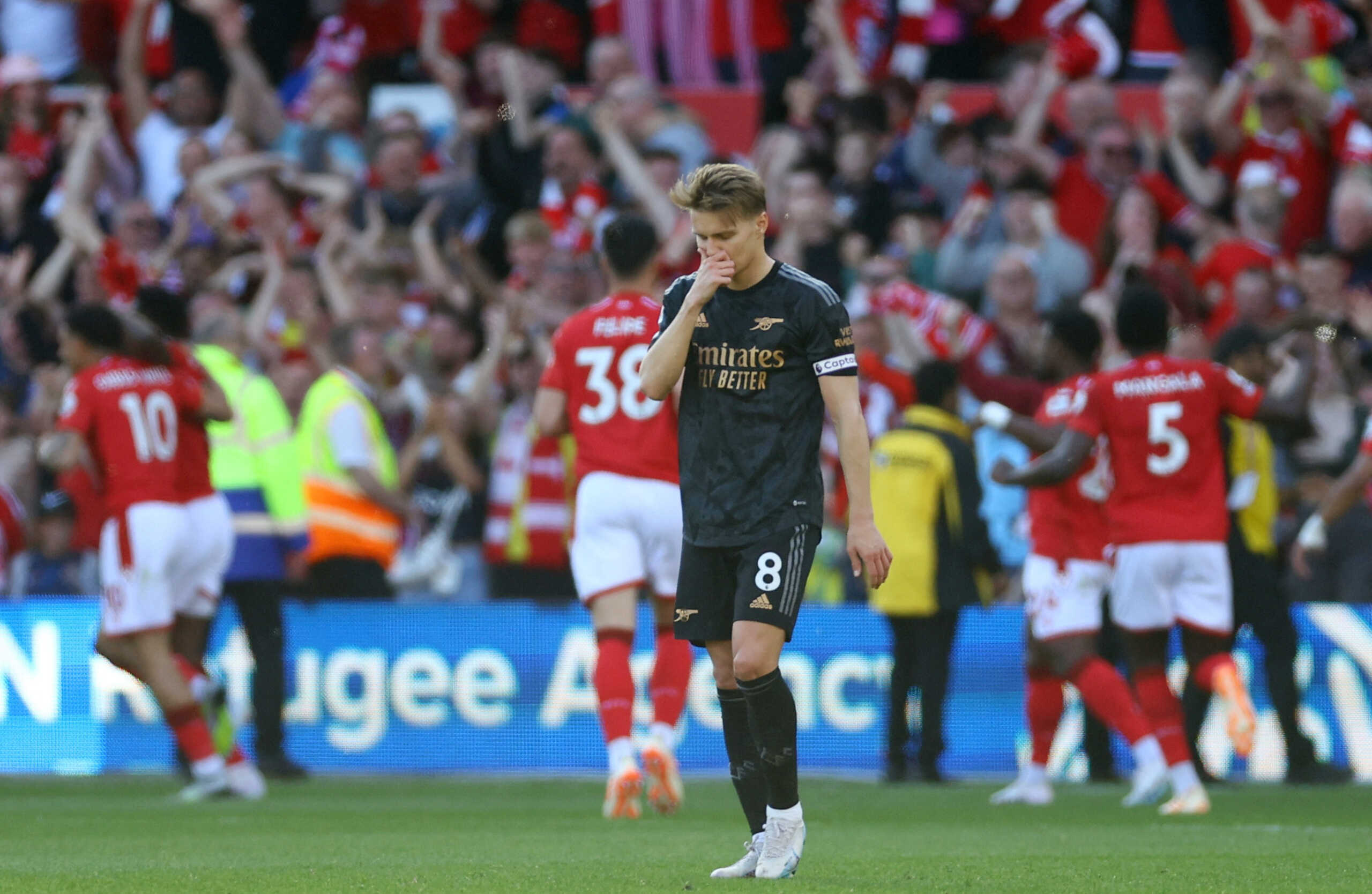 Soccer Football - Premier League - Nottingham Forest v Arsenal - The City Ground, Nottingham, Britain - May 20, 2023  Arsenal's Martin Odegaard reacts after Nottingham Forest's Taiwo Awoniyi scores their first goal REUTERS