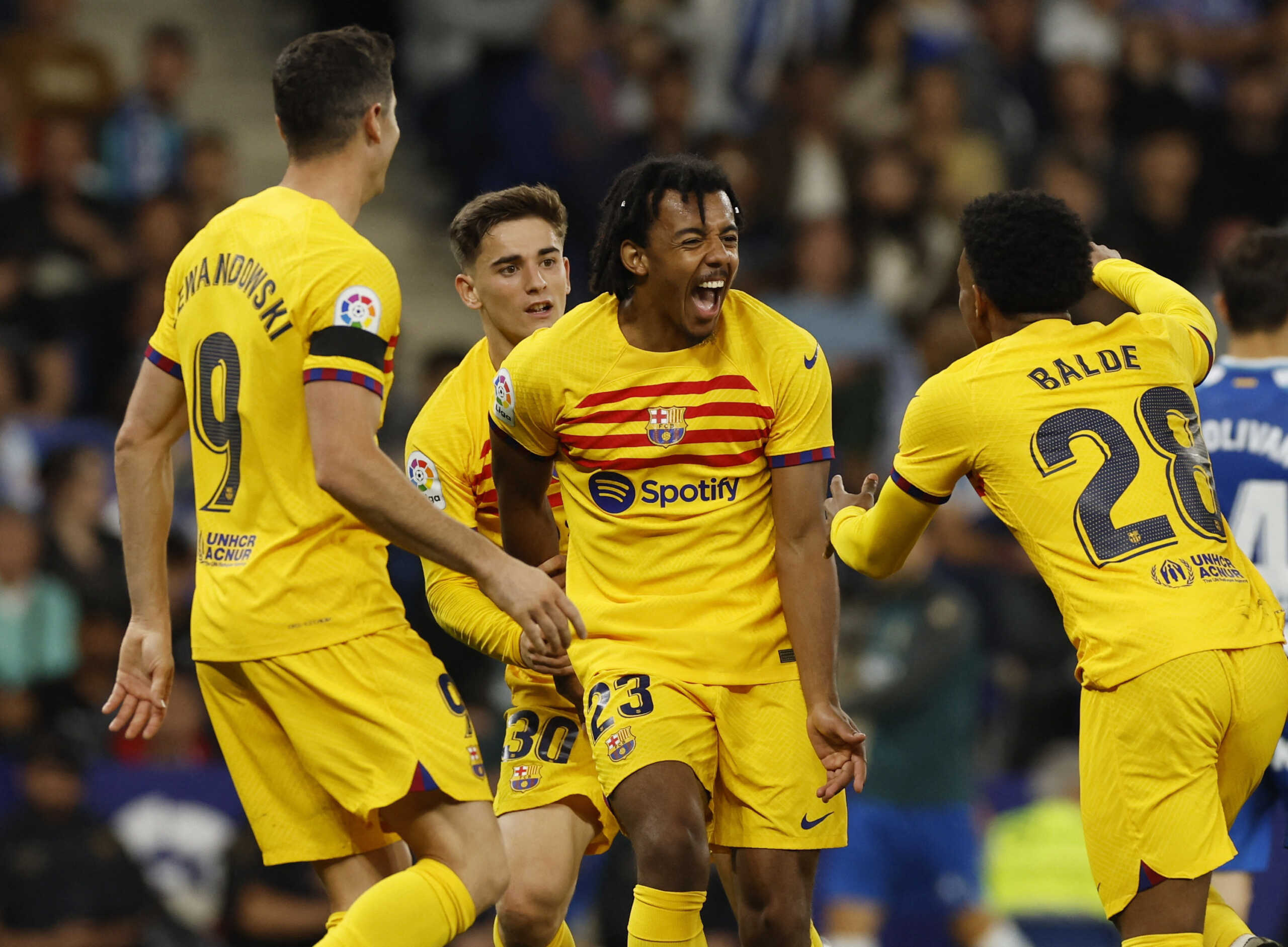 Soccer Football - LaLiga - Espanyol v Barcelona - RCDE Stadium, Cornella de Llobregat, Spain - May 14, 2023 FC Barcelona's Jules Kounde celebrates scoring their fourth goal with Robert Lewandowski, Gavi and Alex Balde REUTERS